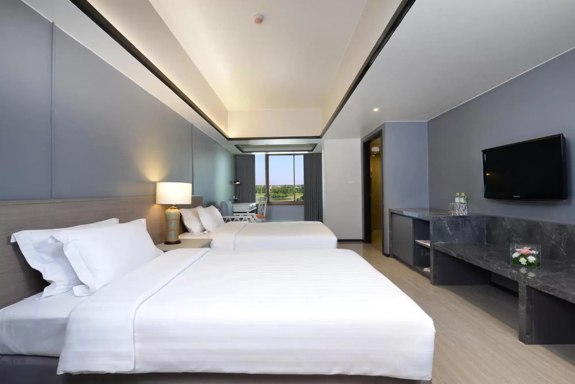 Bed in Tinidee Hotel Bangkok Golf Club - SHA Certified
