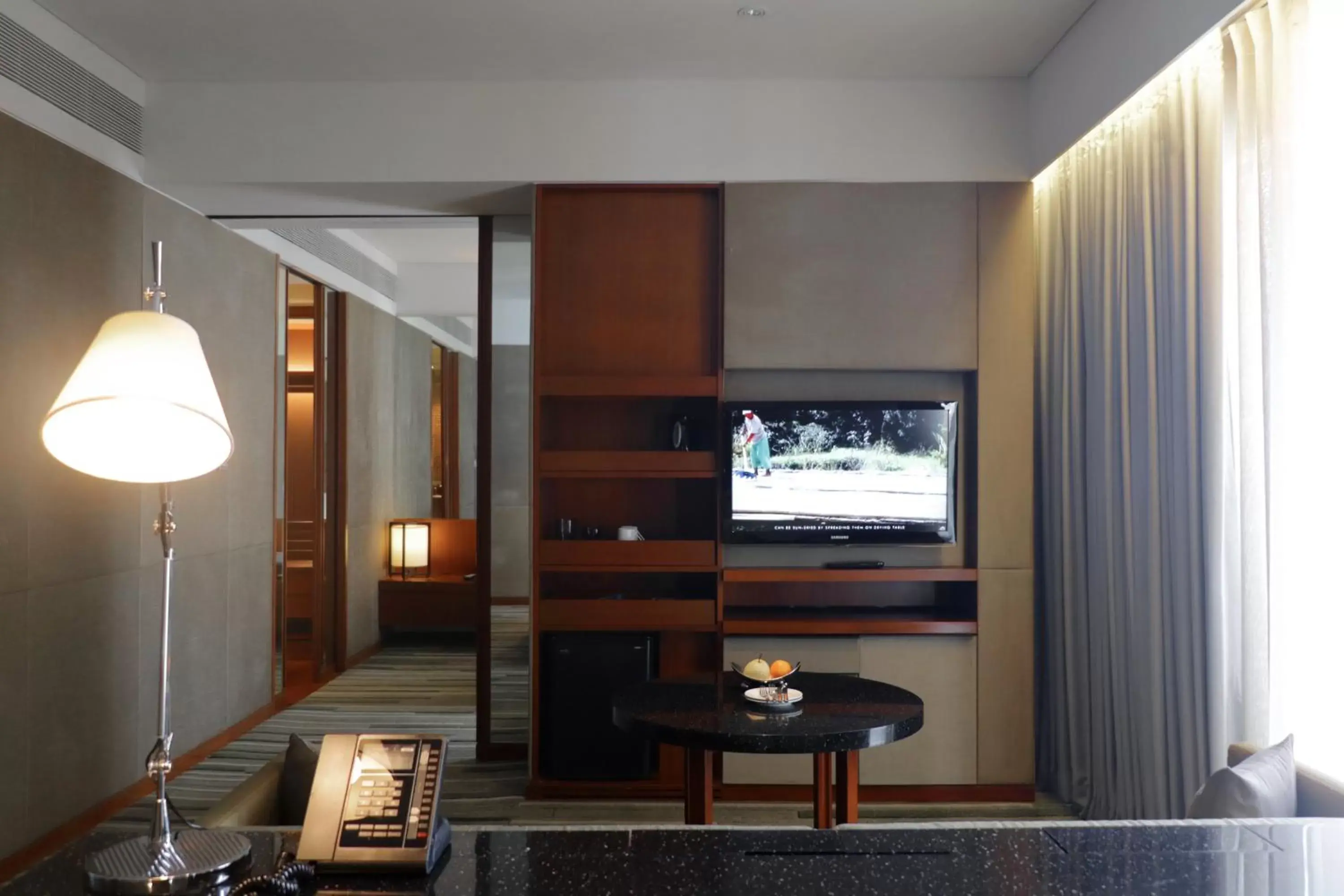 Living room, TV/Entertainment Center in Hansar Bangkok - SHA Extra Plus