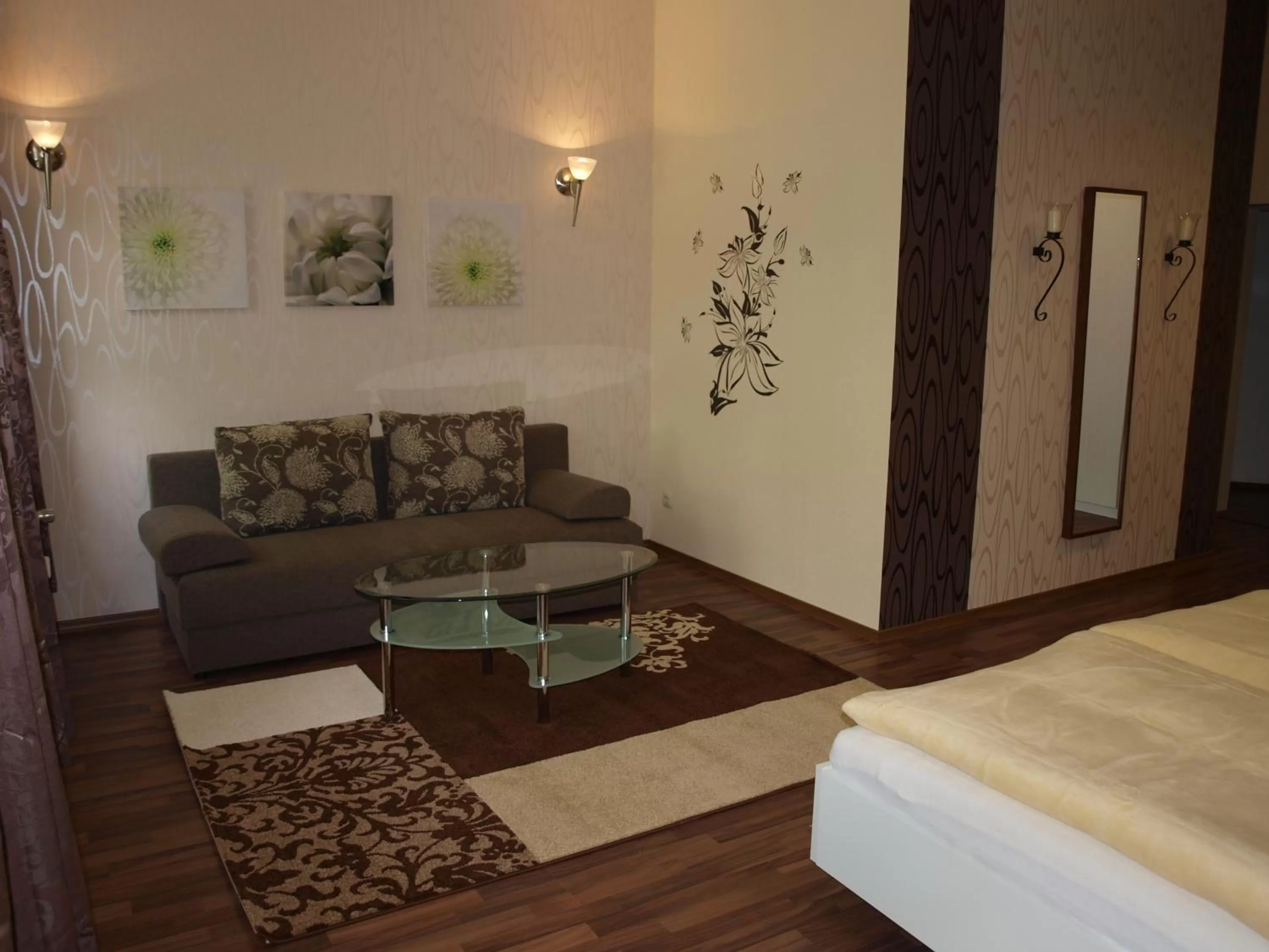 Seating area, Bed in Hotel am Schützenberg