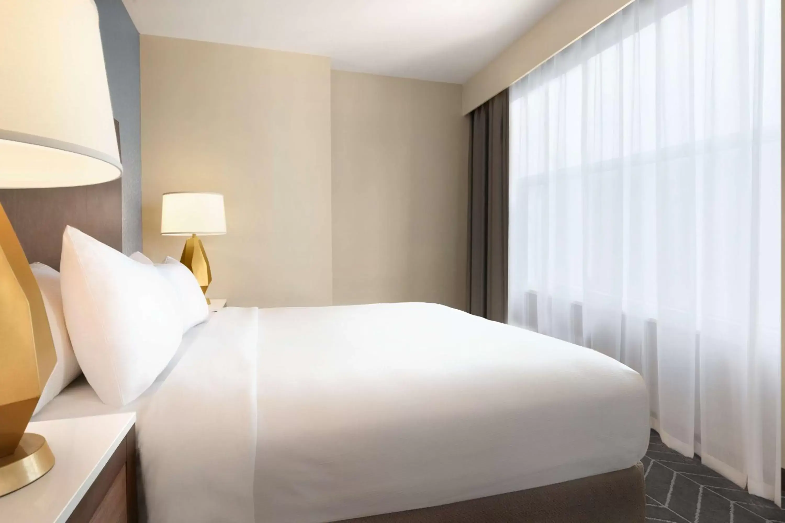 Bed in Embassy Suites By Hilton Wilmington Riverfront Bed in Embassy Suites By Hilton Wilmington Riverfront