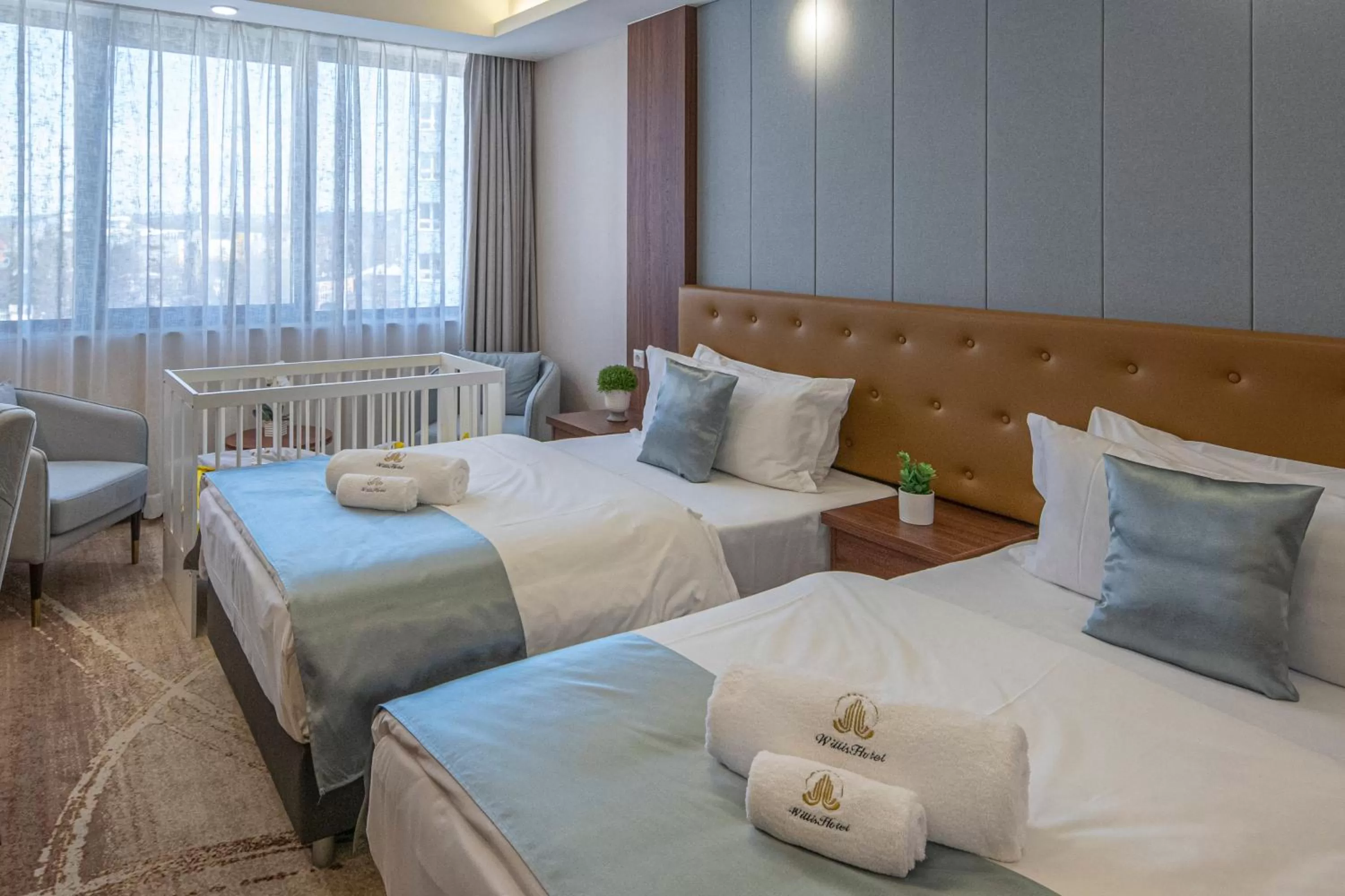 Bed in Willis Hotel Business & Wellness