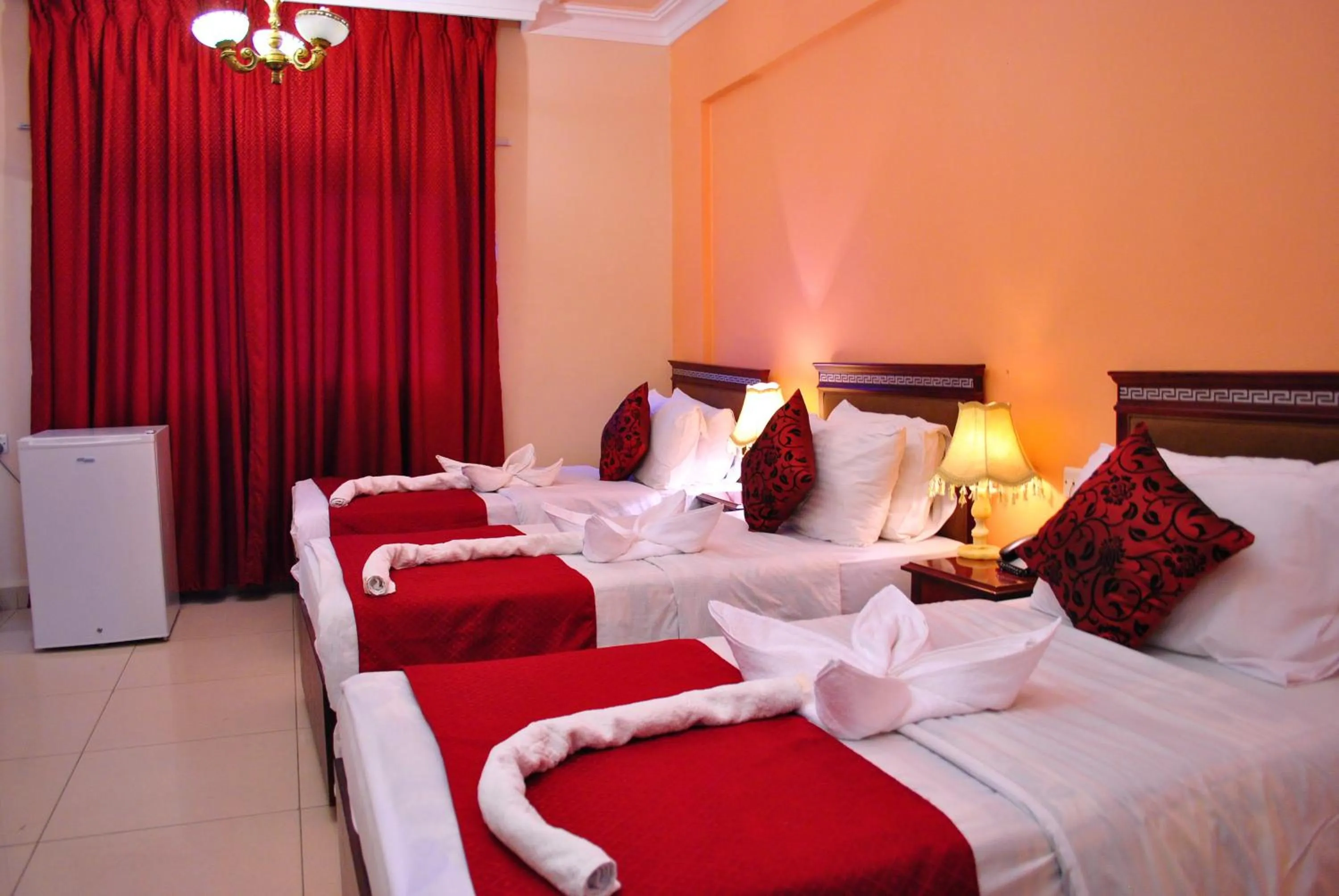 Bed in Al Qidra Hotel & Suites Aqaba