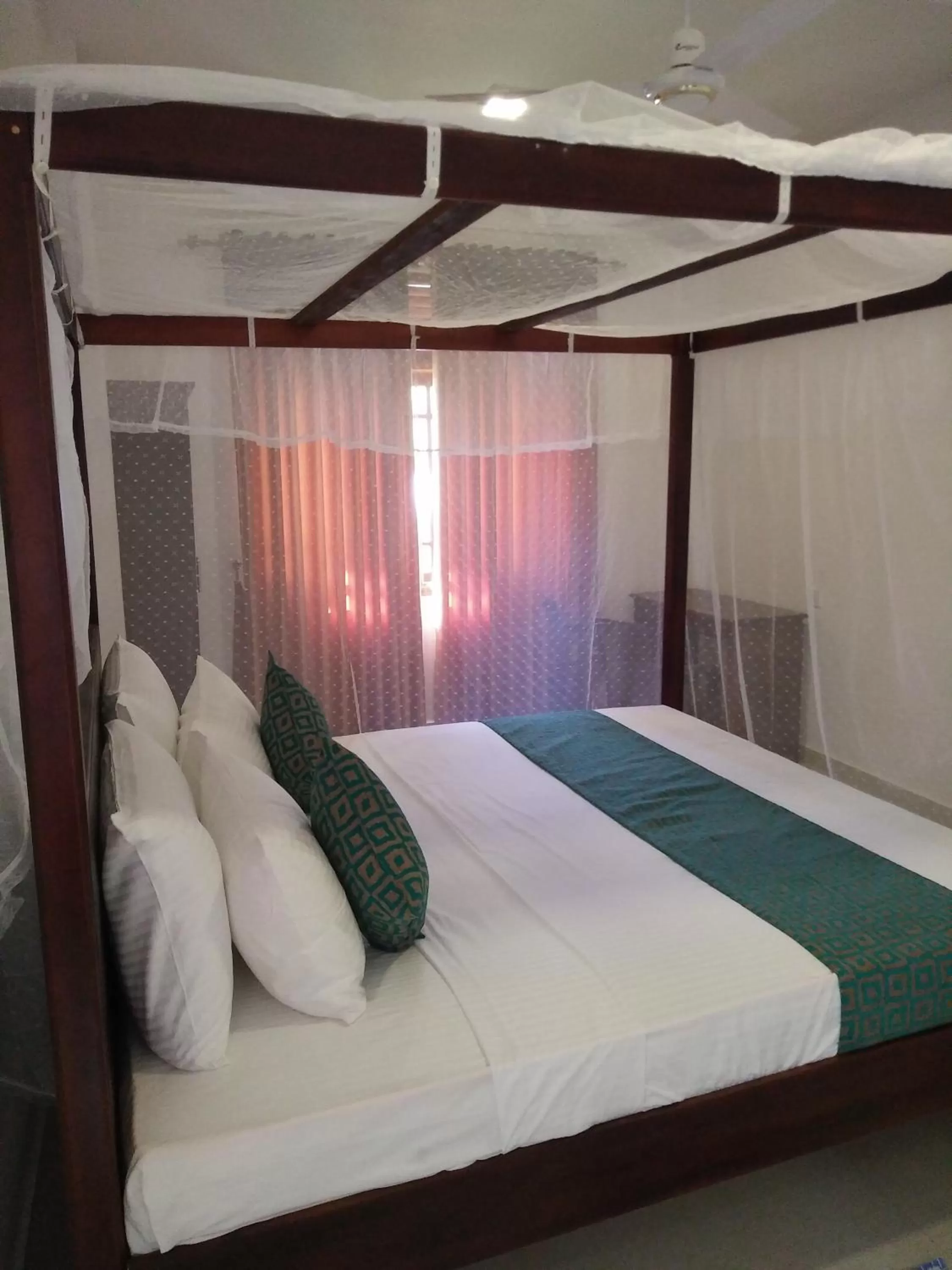 Bed in Ocean Bay Surf Resort Weligama