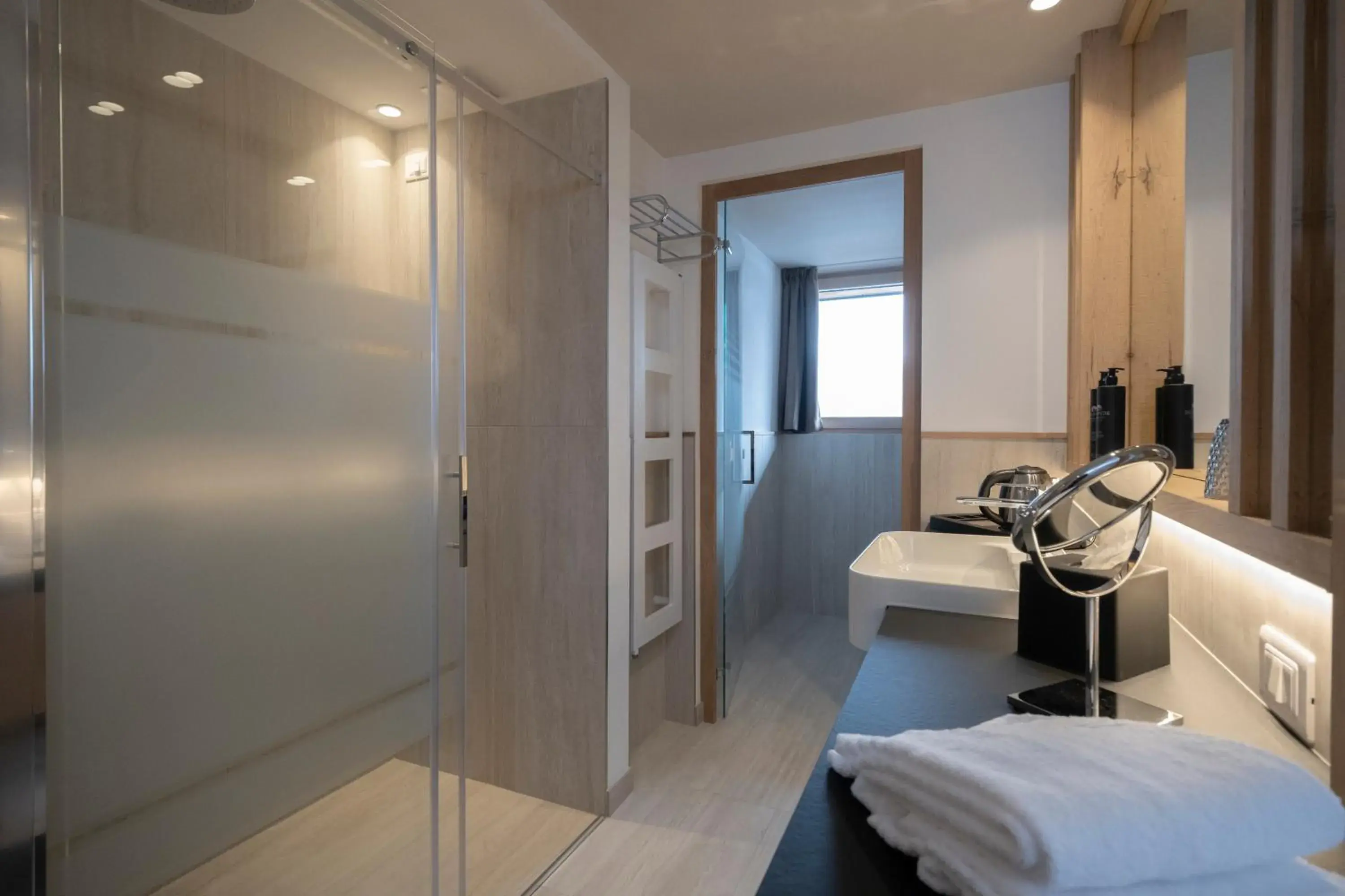 Shower in Ciampedie Luxury Alpine Spa Hotel