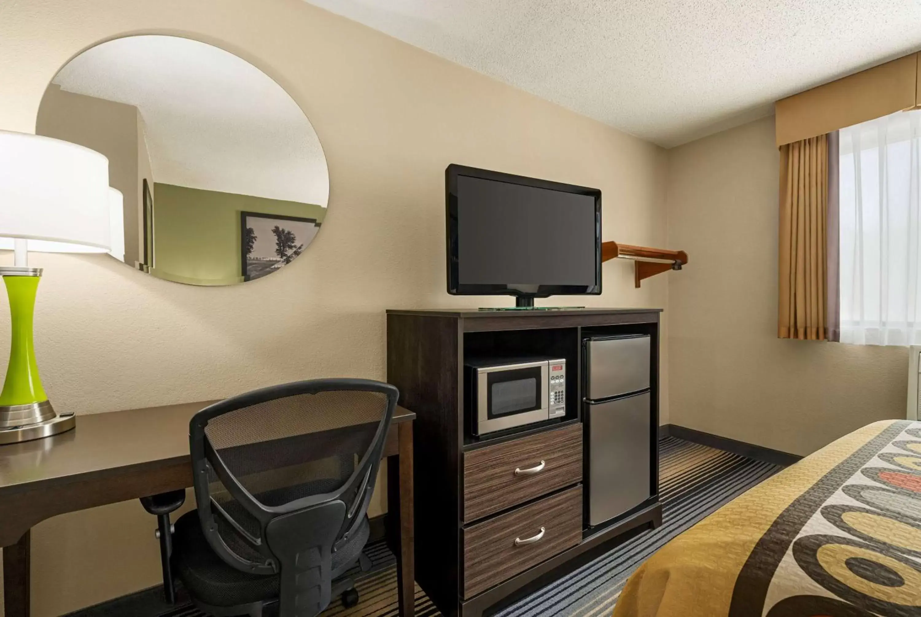 Photo of the whole room, TV/Entertainment Center in Super 8 by Wyndham Maysville KY