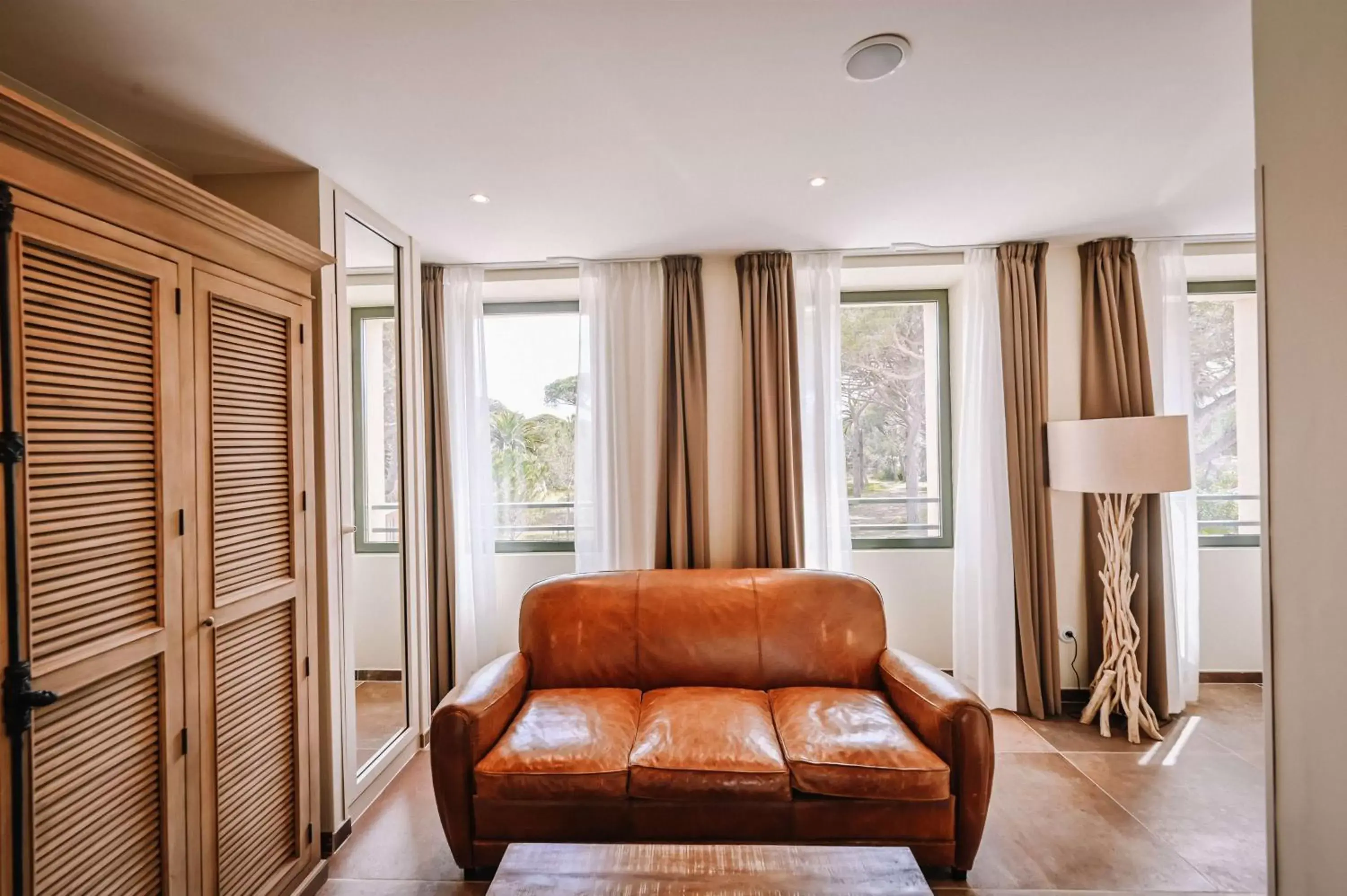 Living room, Seating Area in Le Hameau Des Pesquiers Ecolodge & Spa, Curio Collection By Hilton