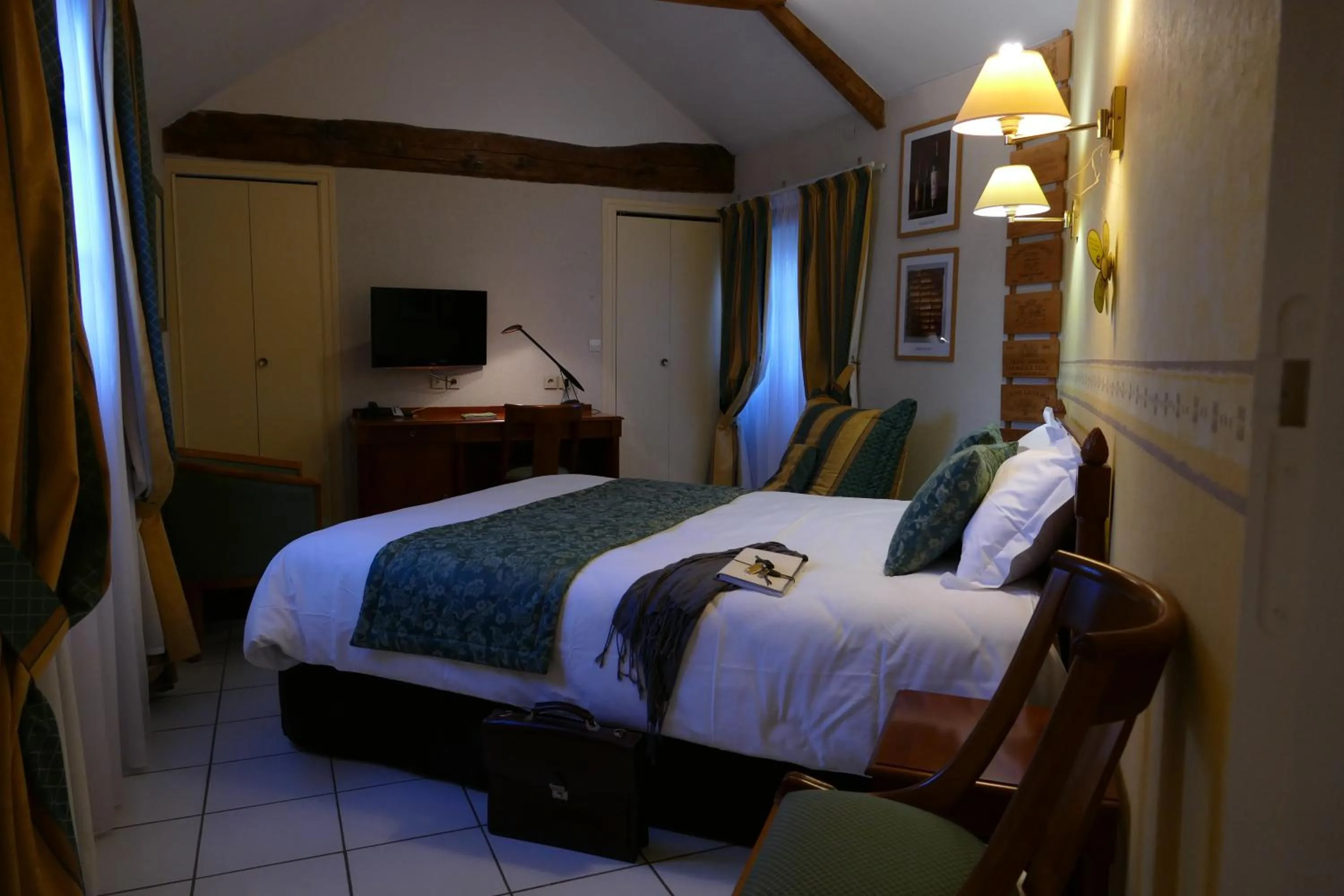 Bed in Logis Hotels Le Champalud Restaurant La Citadelle