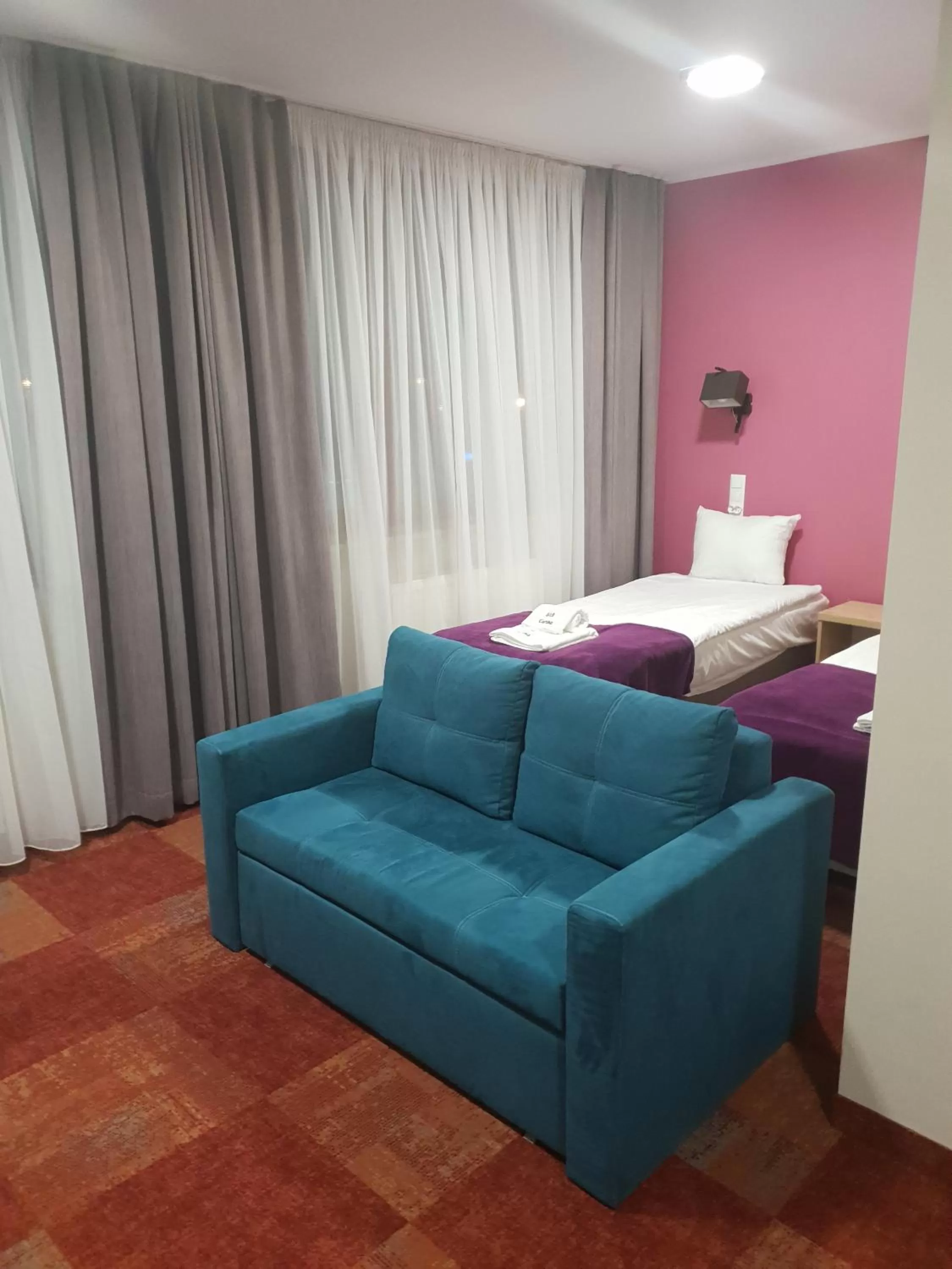 Photo of the whole room, Bed in Carina Hotel