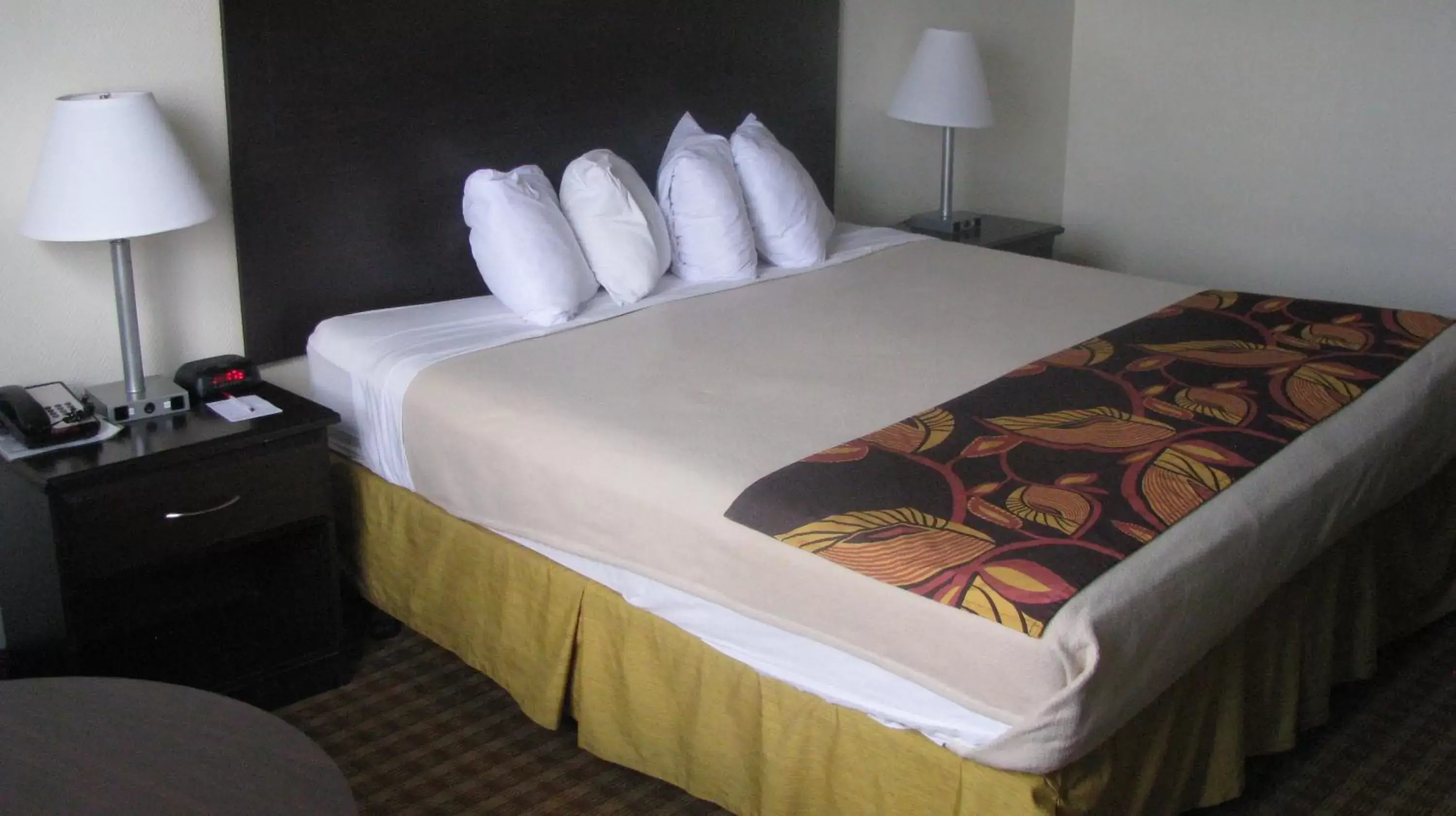 Bed in Ramada Suites By Wyndham Orlando International Drive