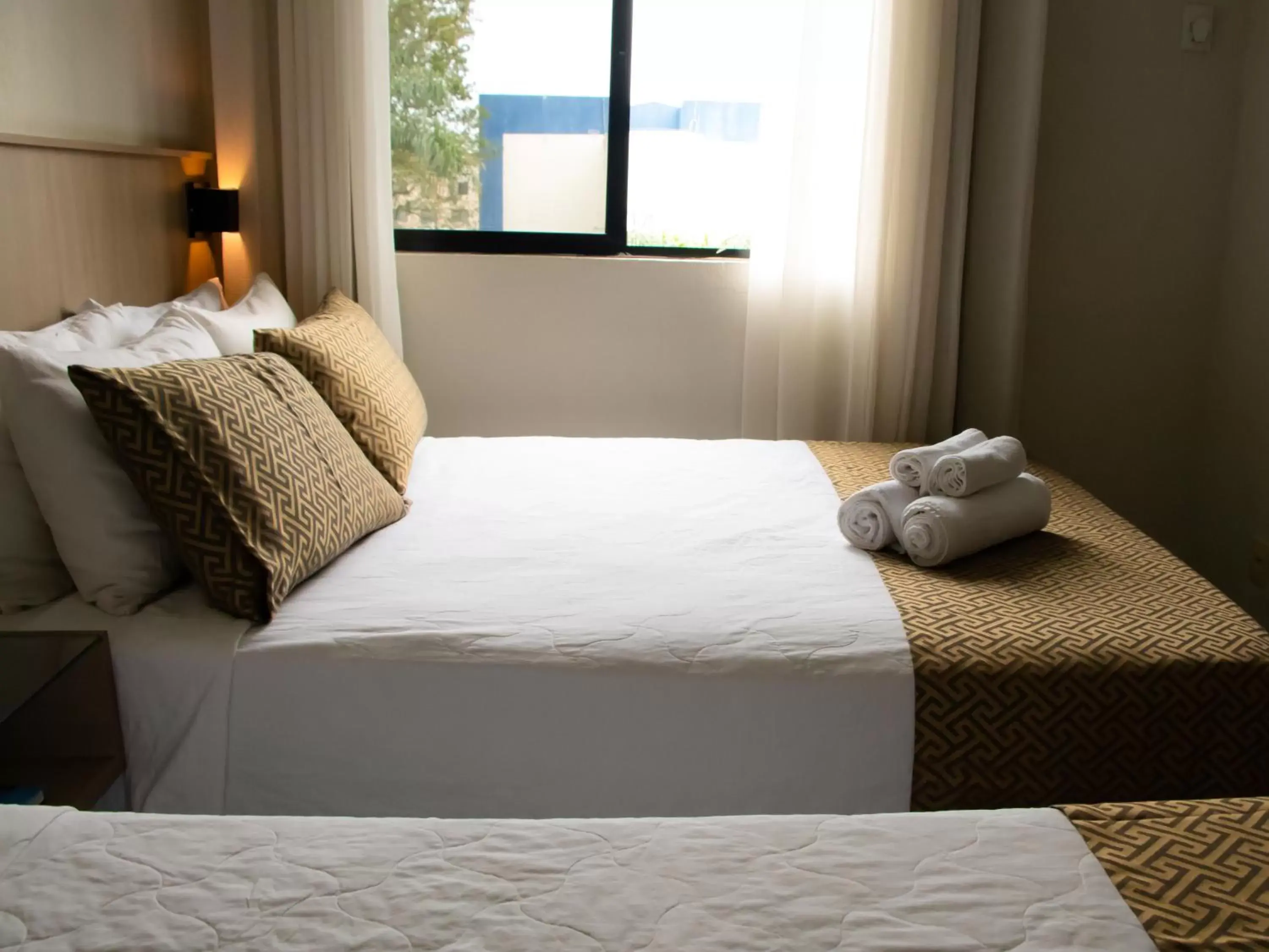 Bed in Iguassu Express Hotel