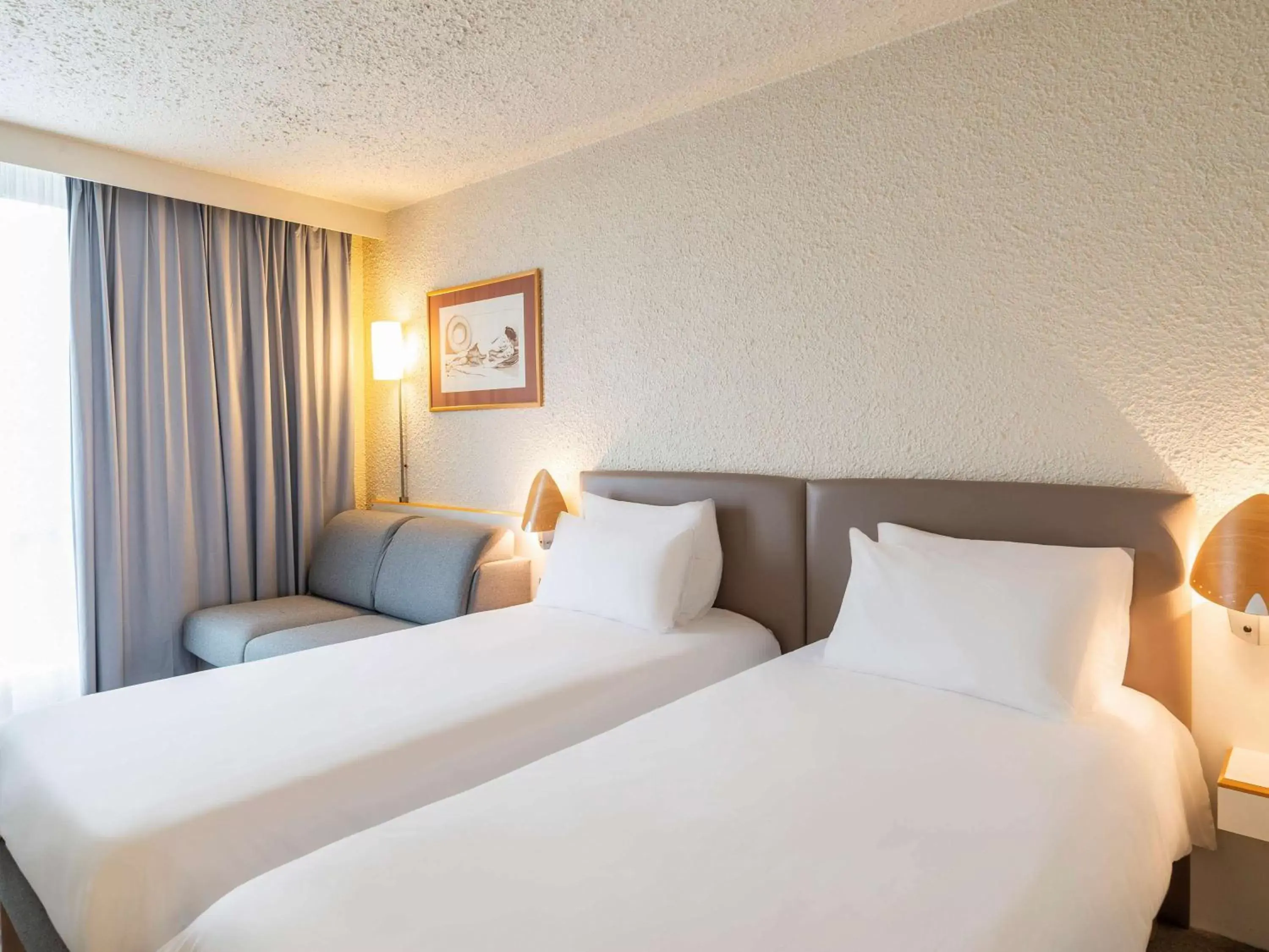 Photo of the whole room, Bed in Novotel Mulhouse Bâle Fribourg