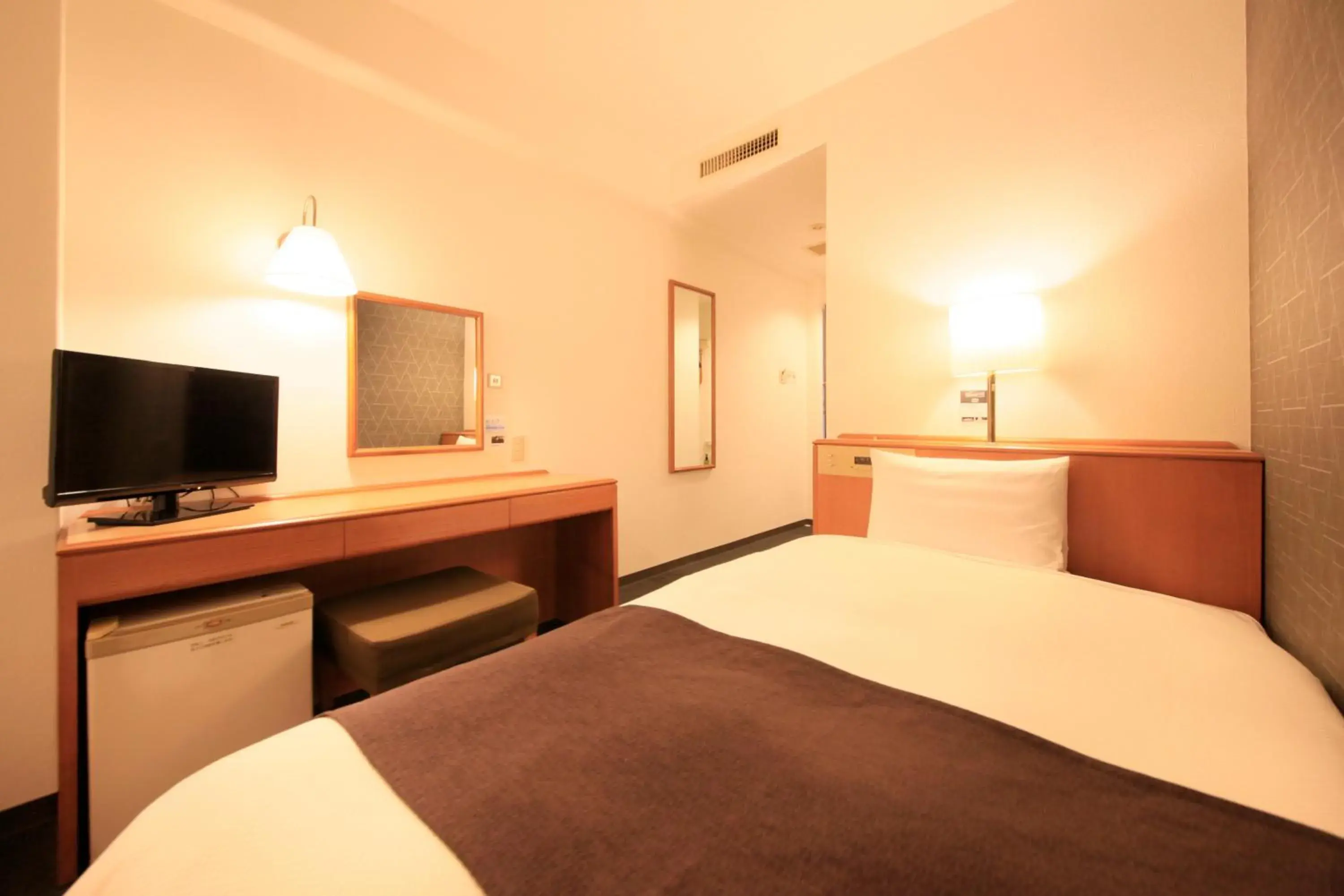 Photo of the whole room, Bed in Smile Hotel Tokyo Ayase Ekimae Photo of the whole room, Bed in Smile Hotel Tokyo Ayase Ekimae