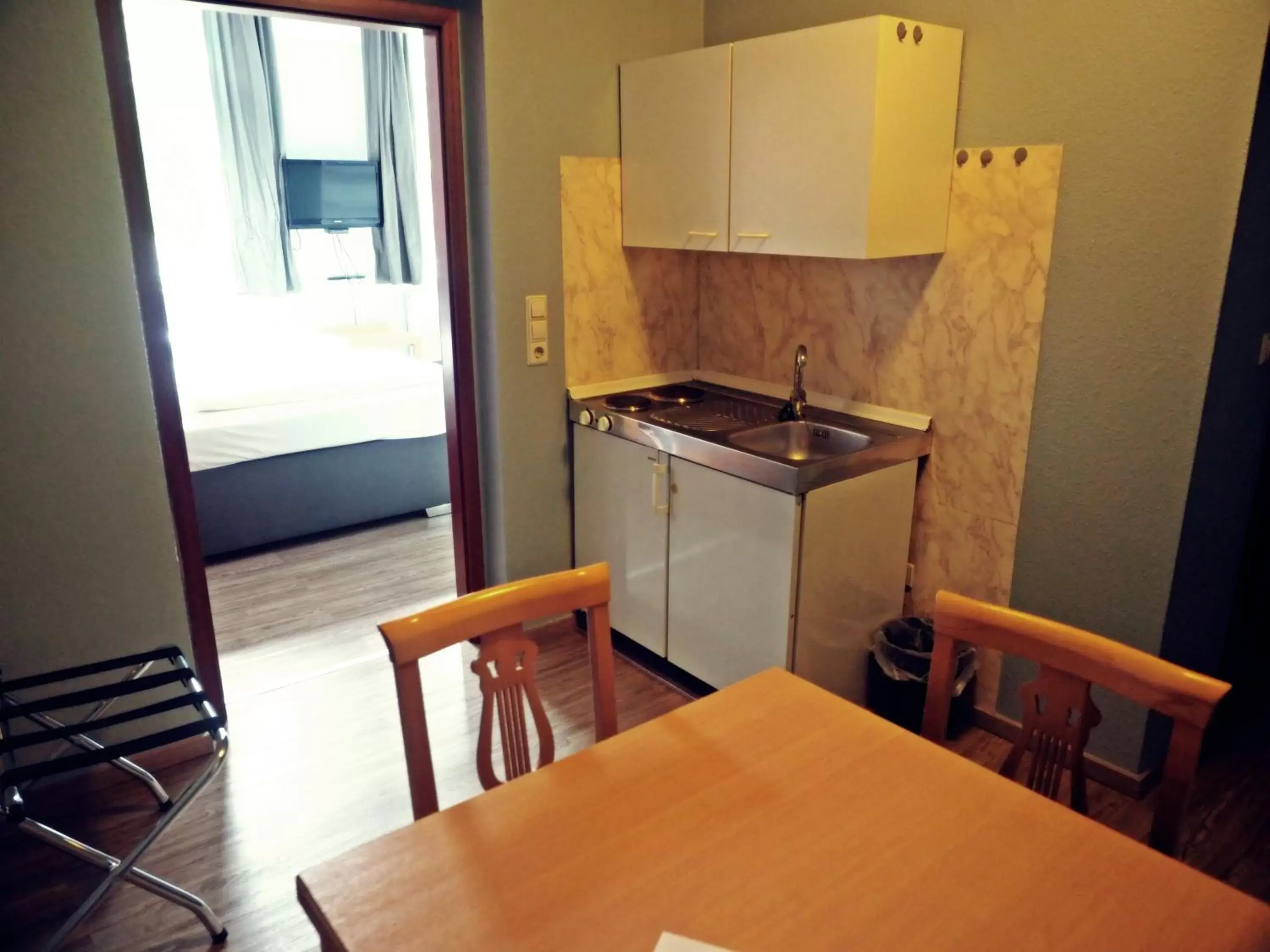 Kitchen or kitchenette in Apart Hotel Sarstedter Hof