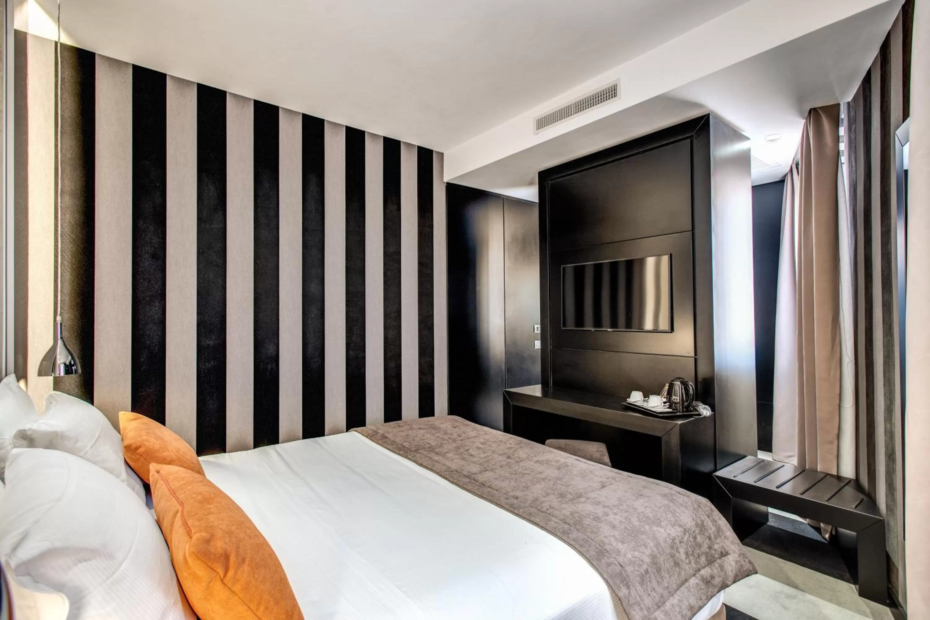 Bed in Doria Palace Boutique Hotel