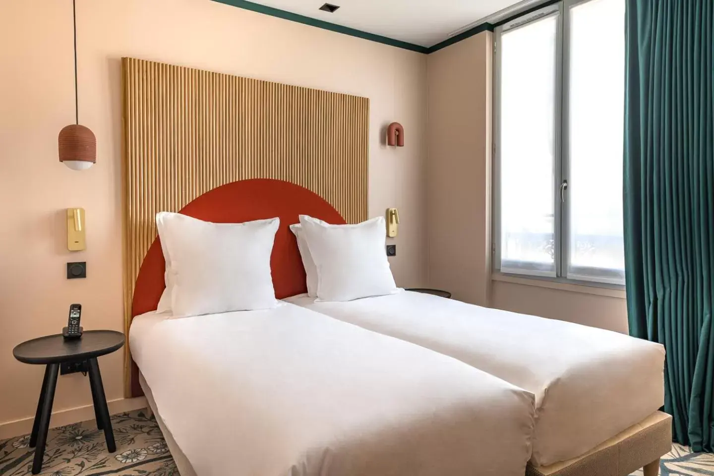 Bed in O.Lysée Hotel