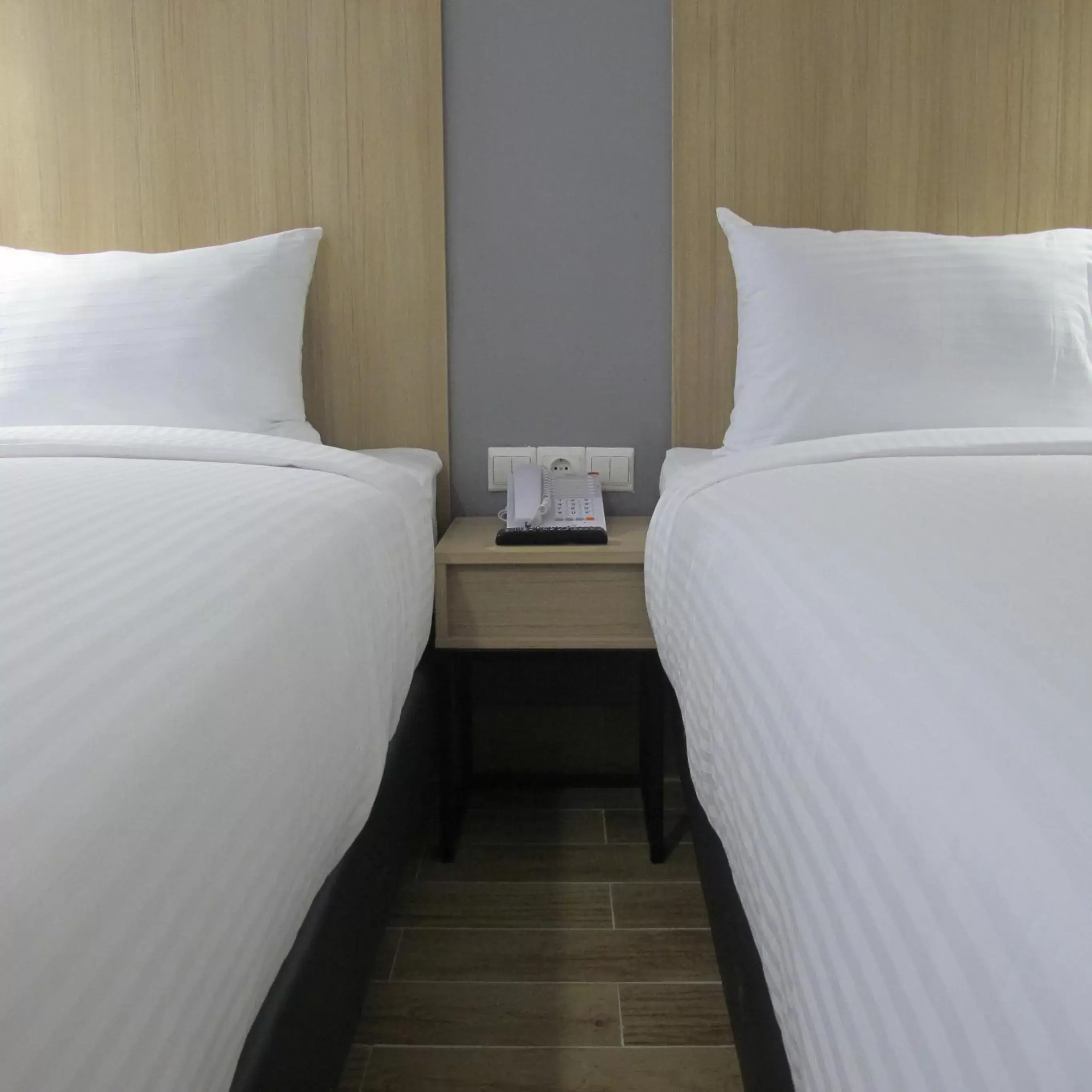 Bed in Hotel Citradream Semarang