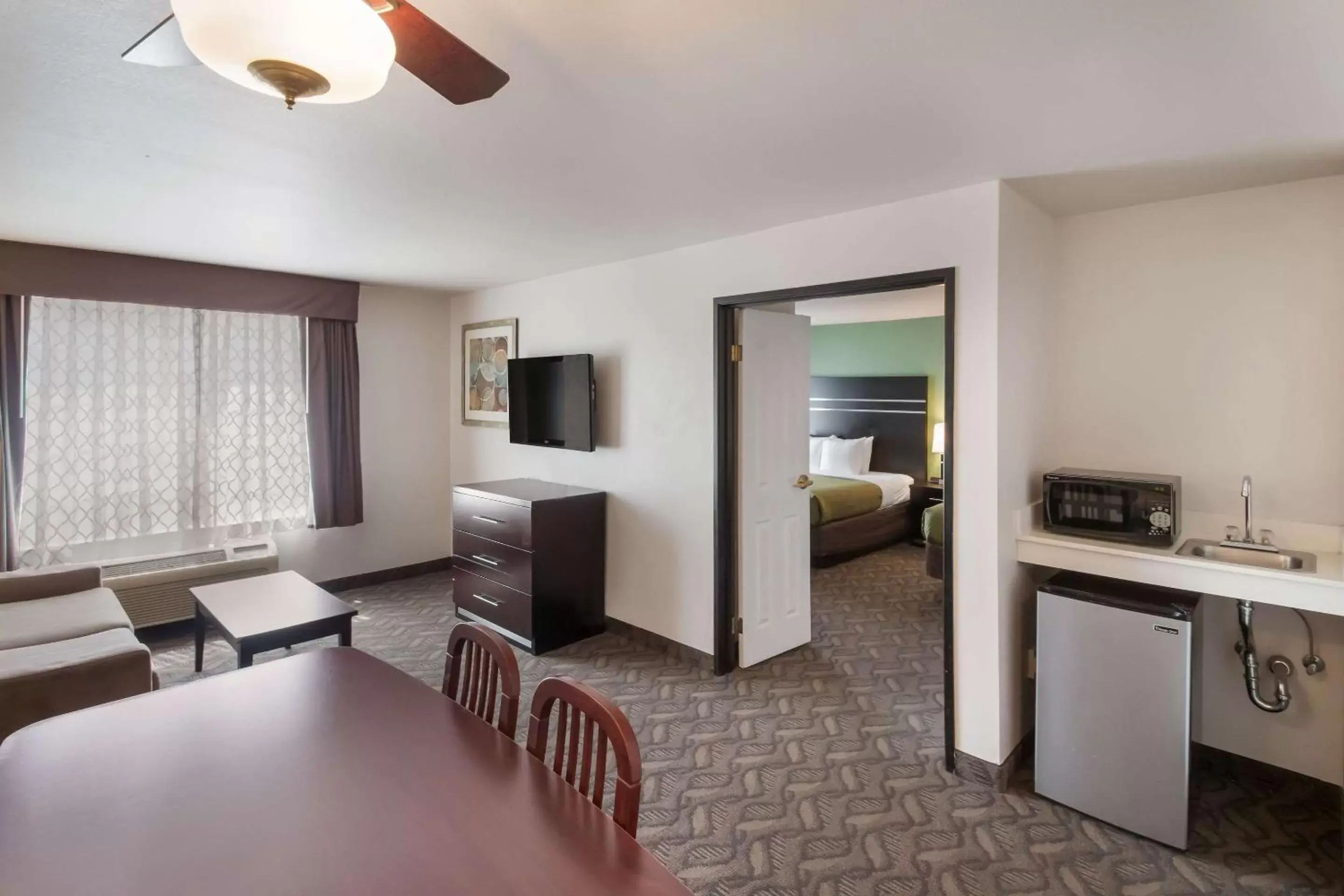 Photo of the whole room, Seating Area in Quality Inn & Suites Airport West Salt Lake City