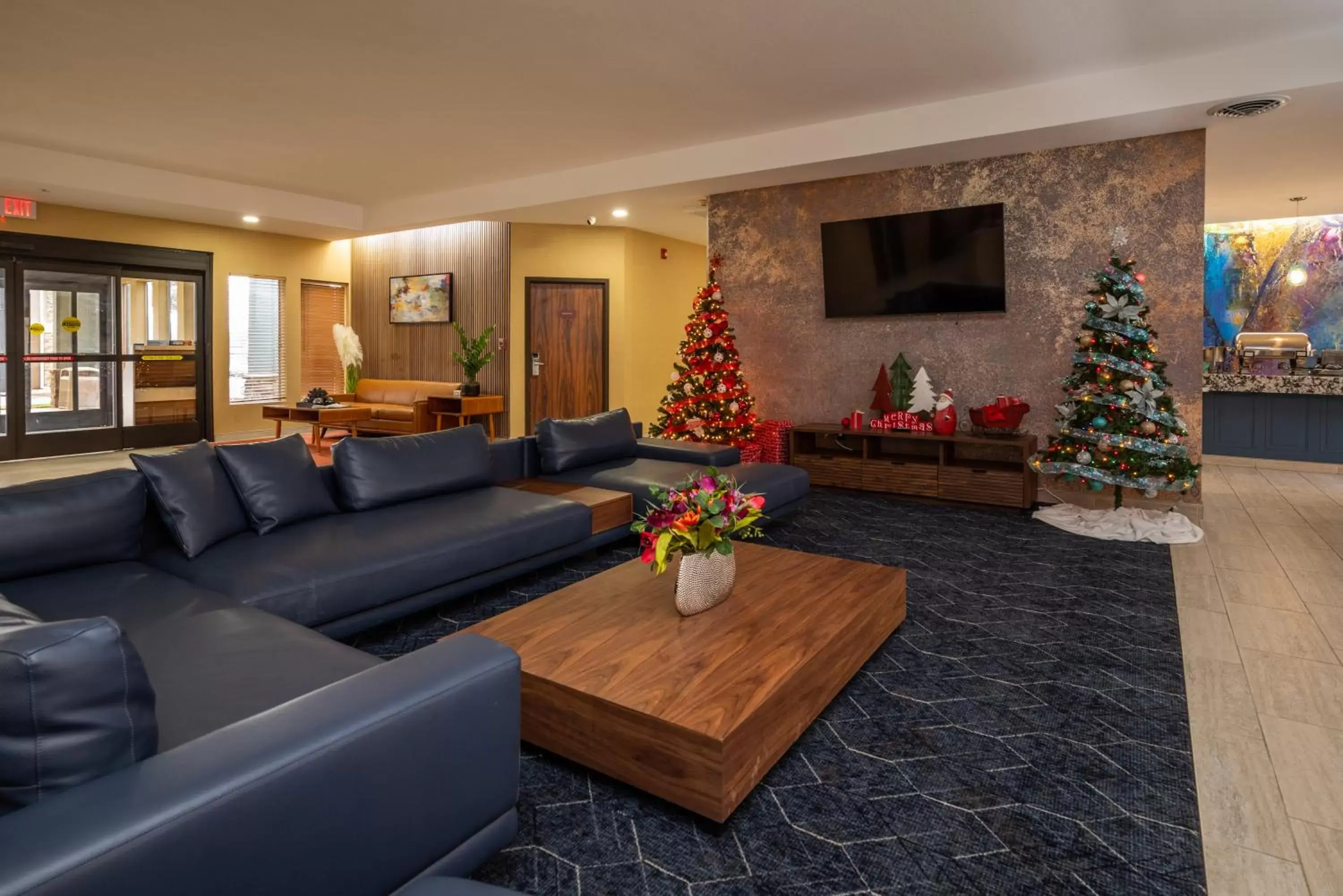 Lobby or reception, Seating Area in Endeavor Inn & Suites, Trademark Collection by Wyndham