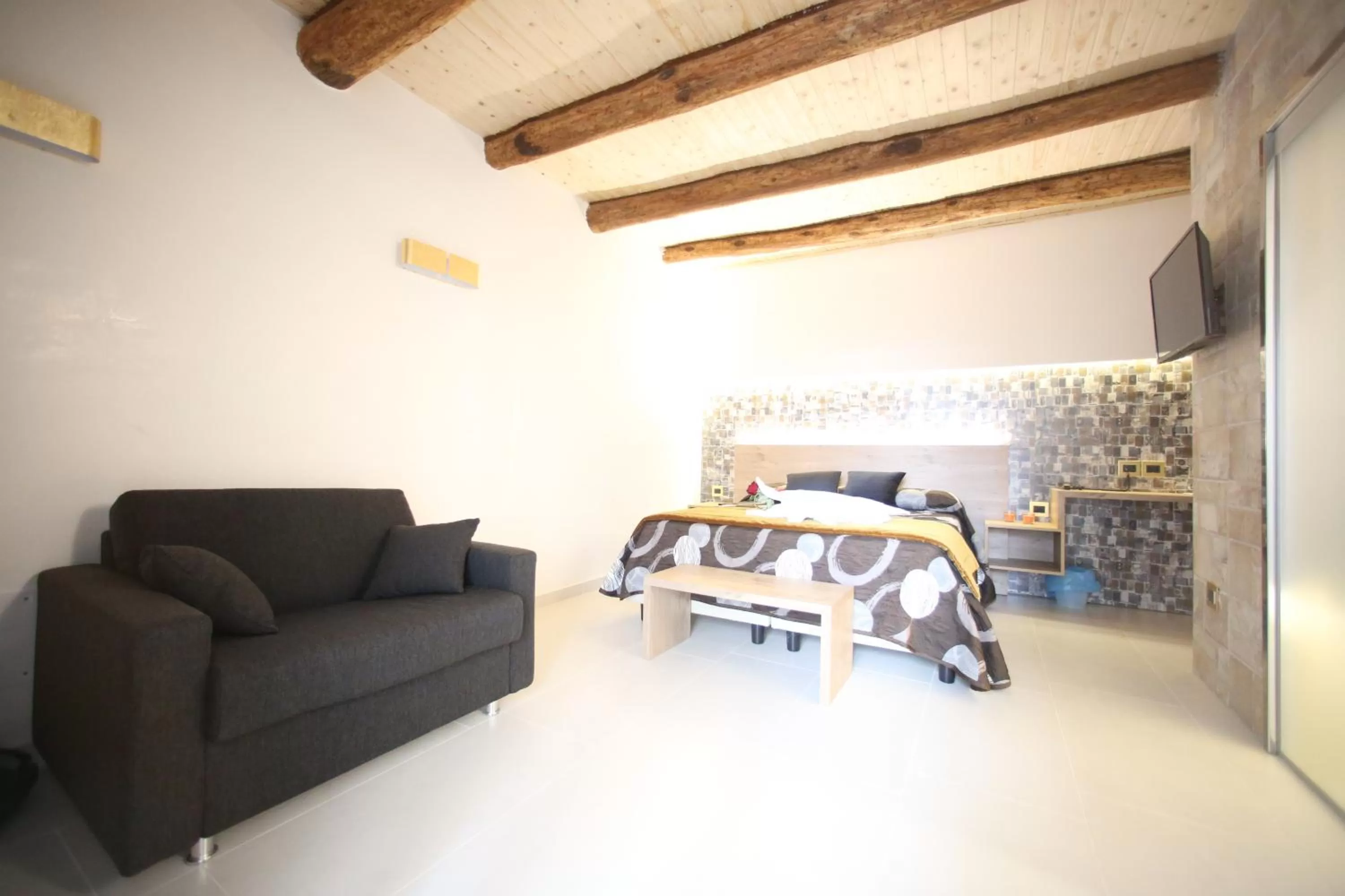 Bed in Relais Piazza Del Plebiscito B&B