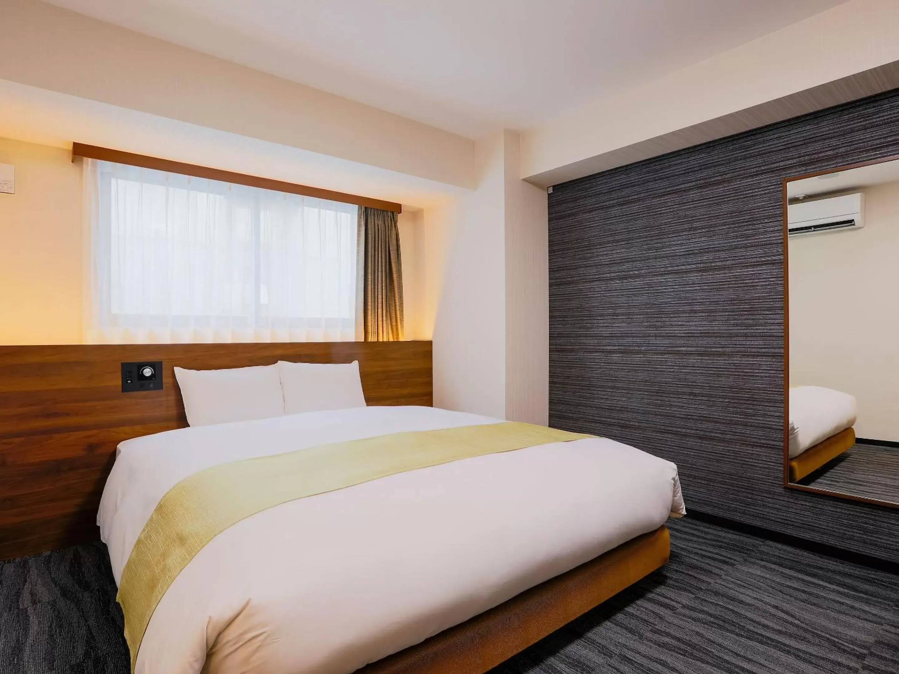 Bed in Hotel Wing International Takamatsu