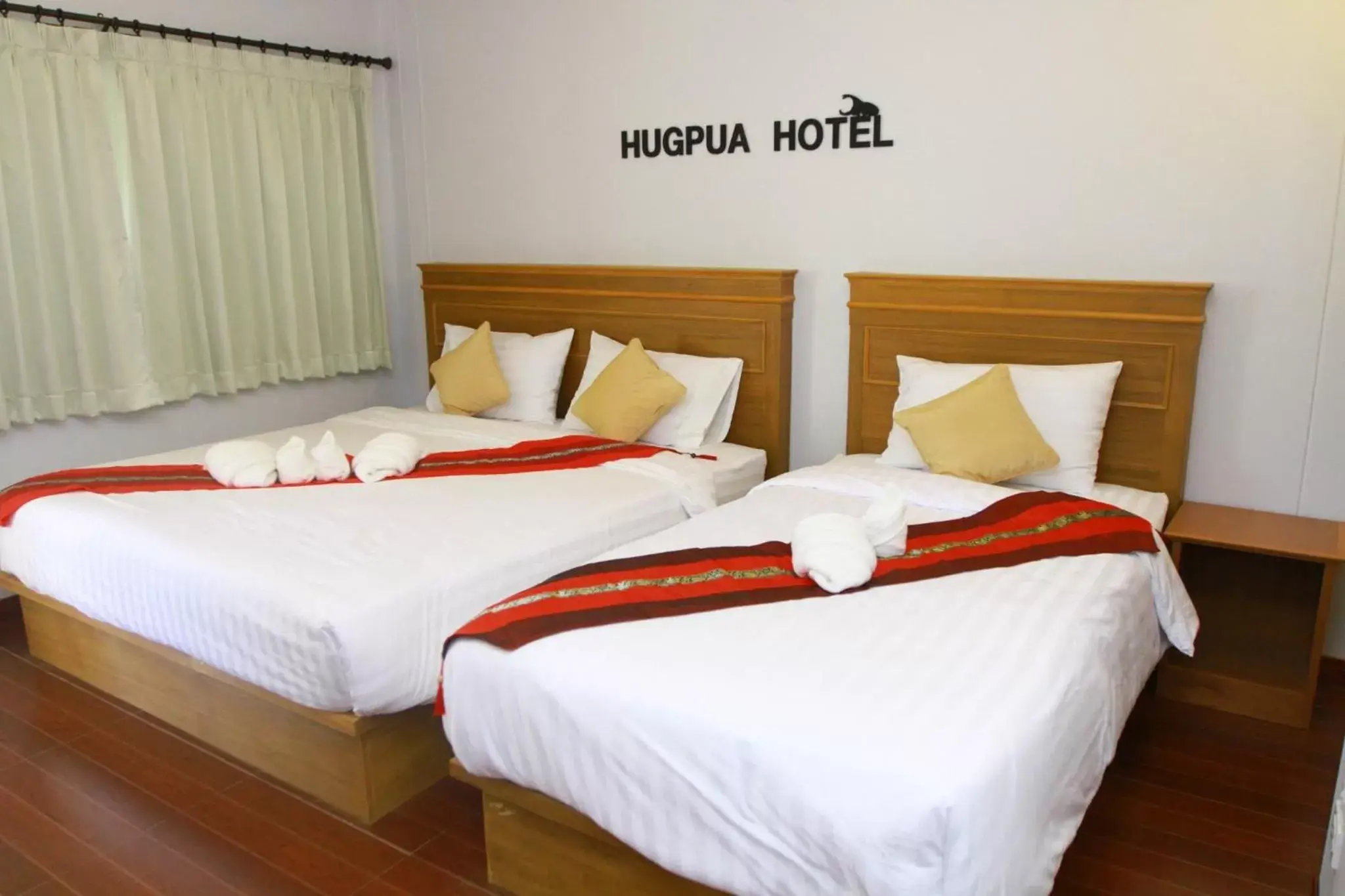 Bed in Hugpua Hotel