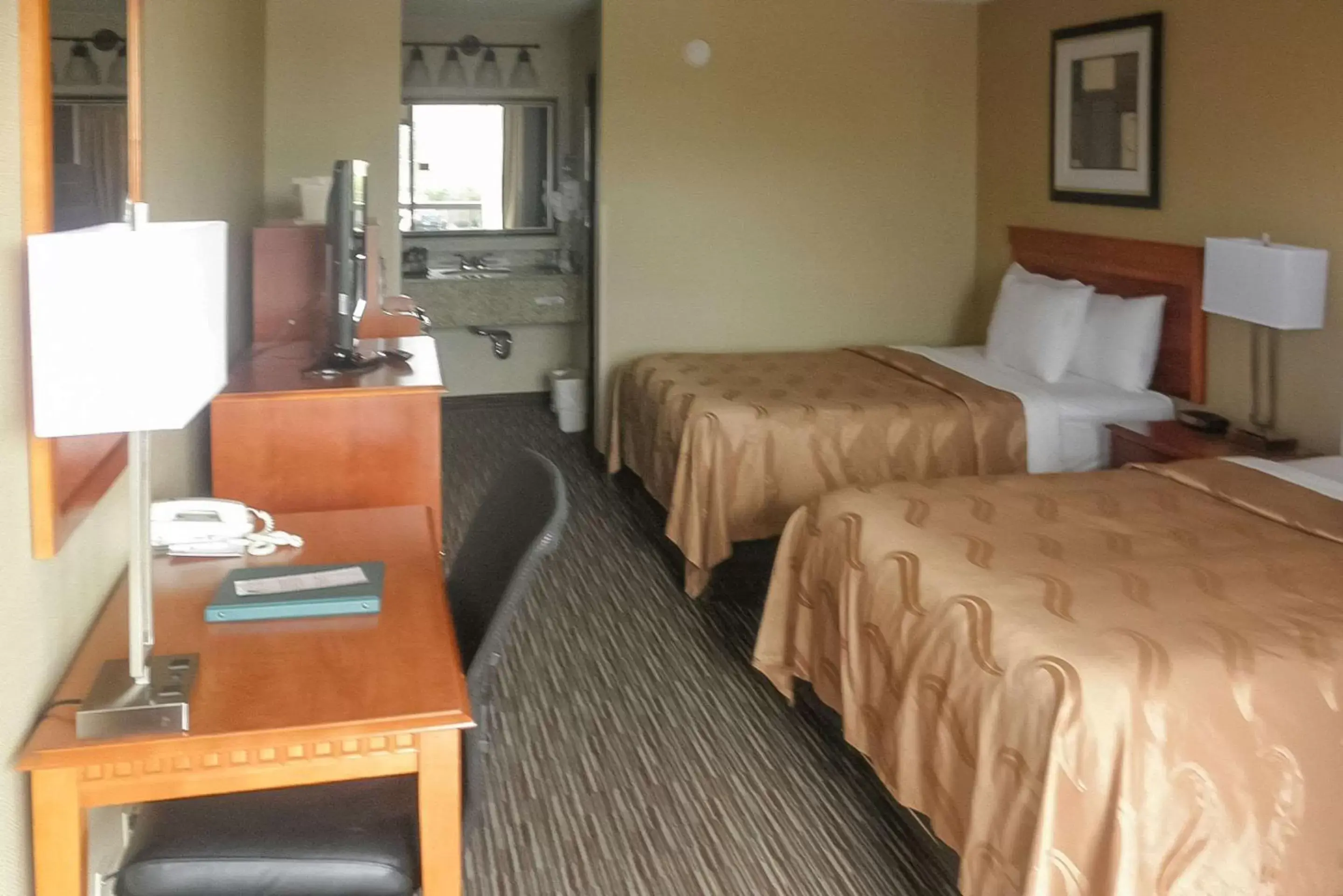 Photo of the whole room, Bed in Quality Inn Columbus, MS Photo of the whole room, Bed in Quality Inn Columbus, MS