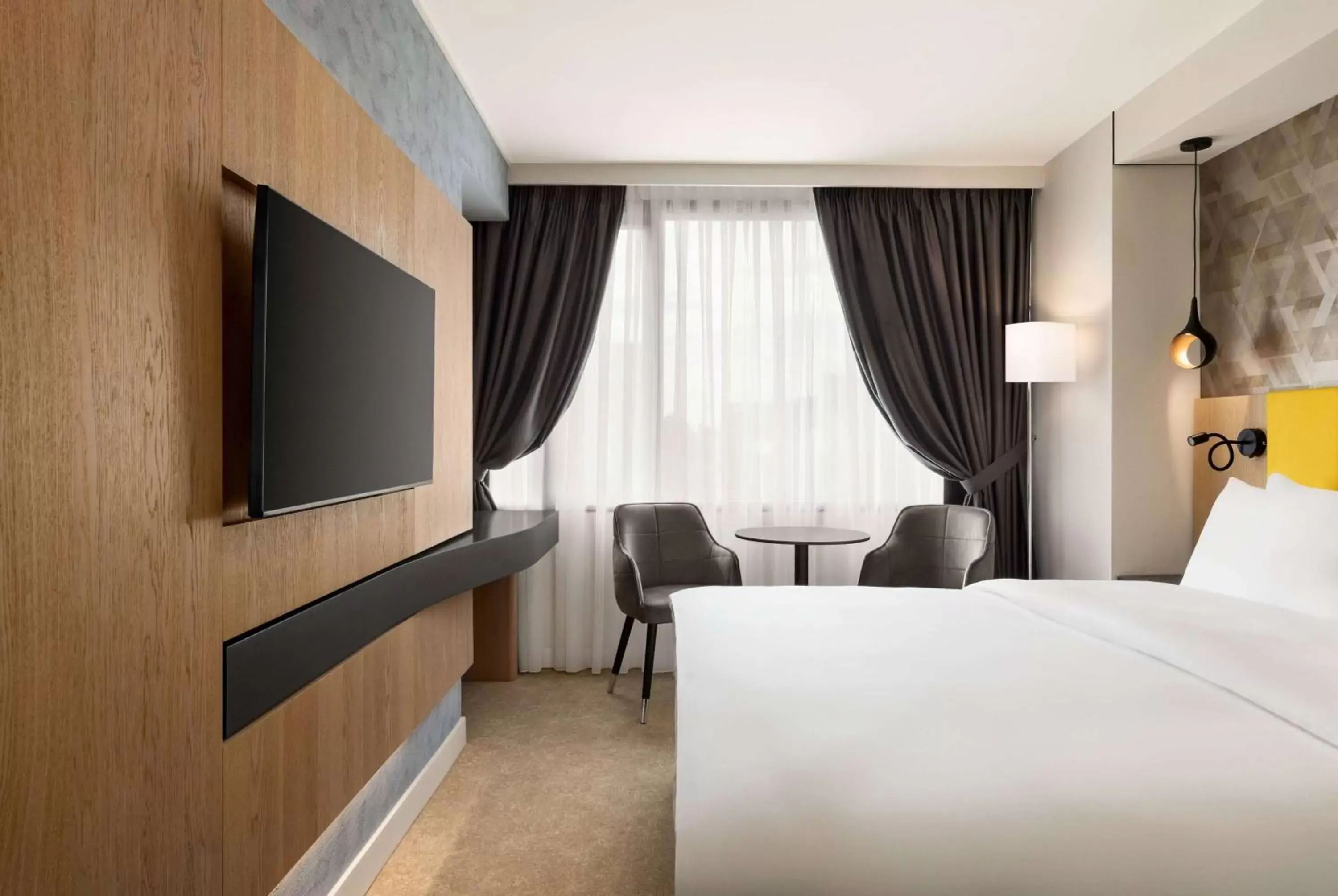 Bed, TV/Entertainment Center in Ramada by Wyndham Slatina Parc