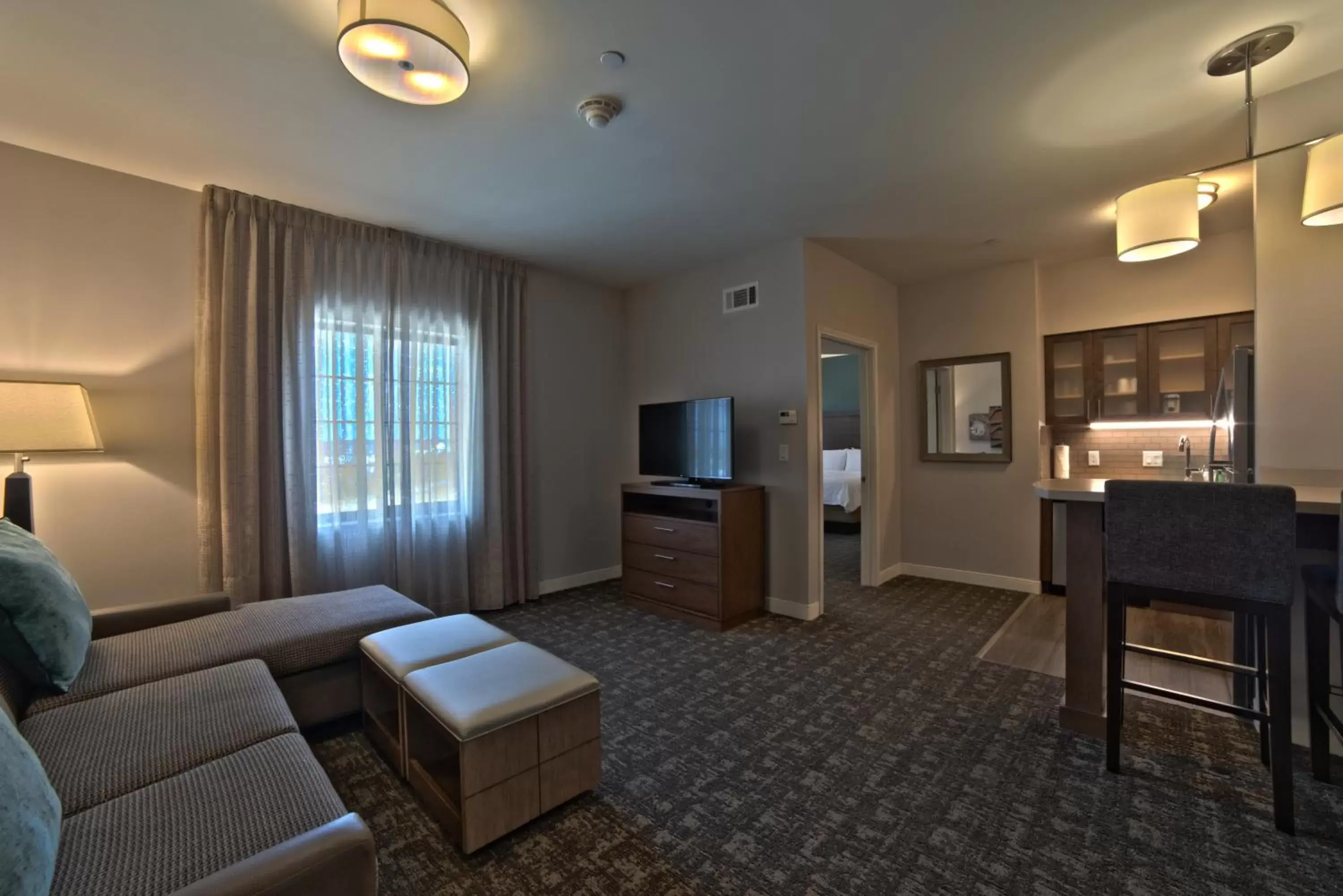 Living room, Seating Area in Staybridge Suites Houston - Humble Beltway 8 E, an IHG Hotel