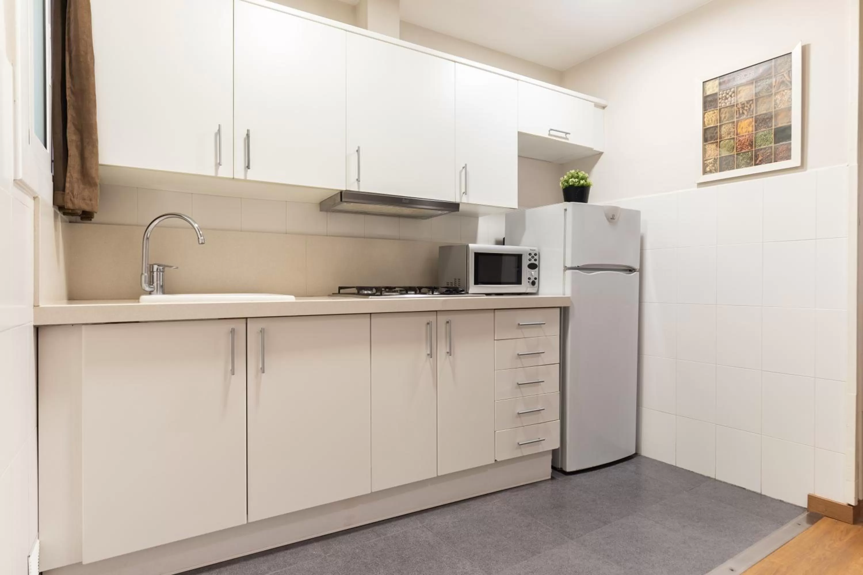 Kitchen or kitchenette in Atica Apartments - by Weflating