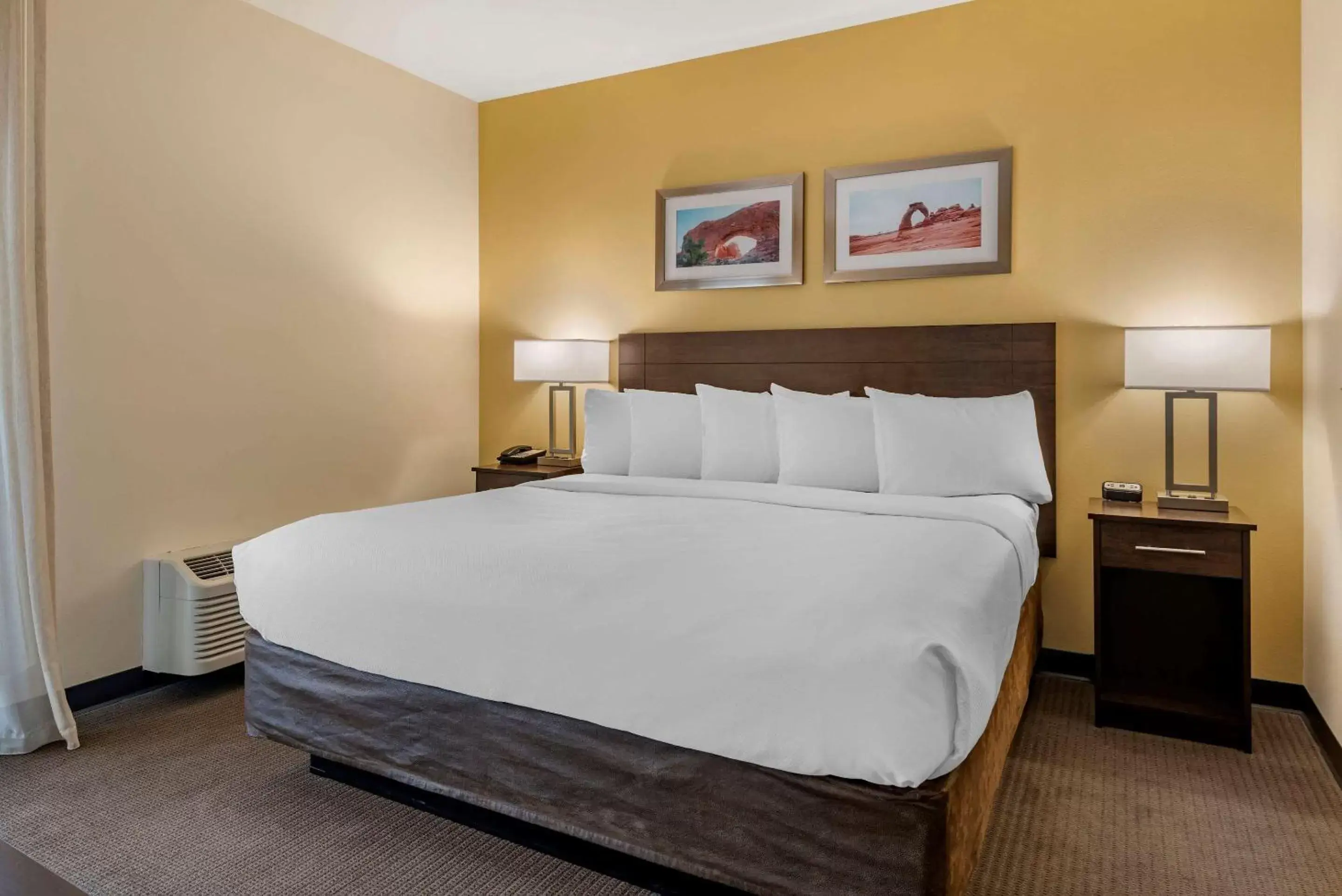 Photo of the whole room, Bed in MainStay Suites Moab near Arches National Park