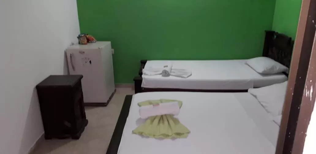 Bed in Hotel Mansión del Cesar