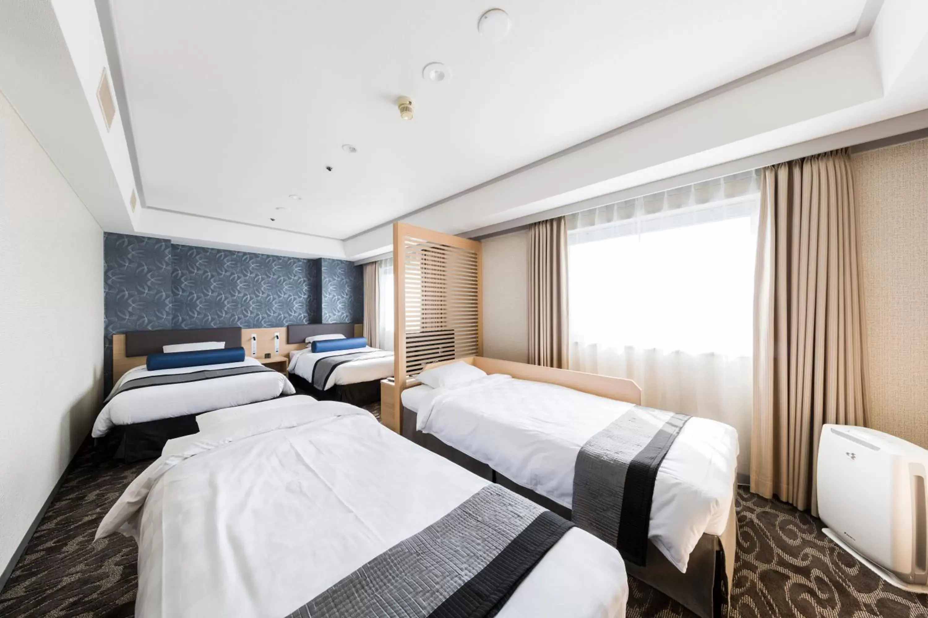 Photo of the whole room, Bed in Shin Osaka Esaka Tokyu REI Hotel