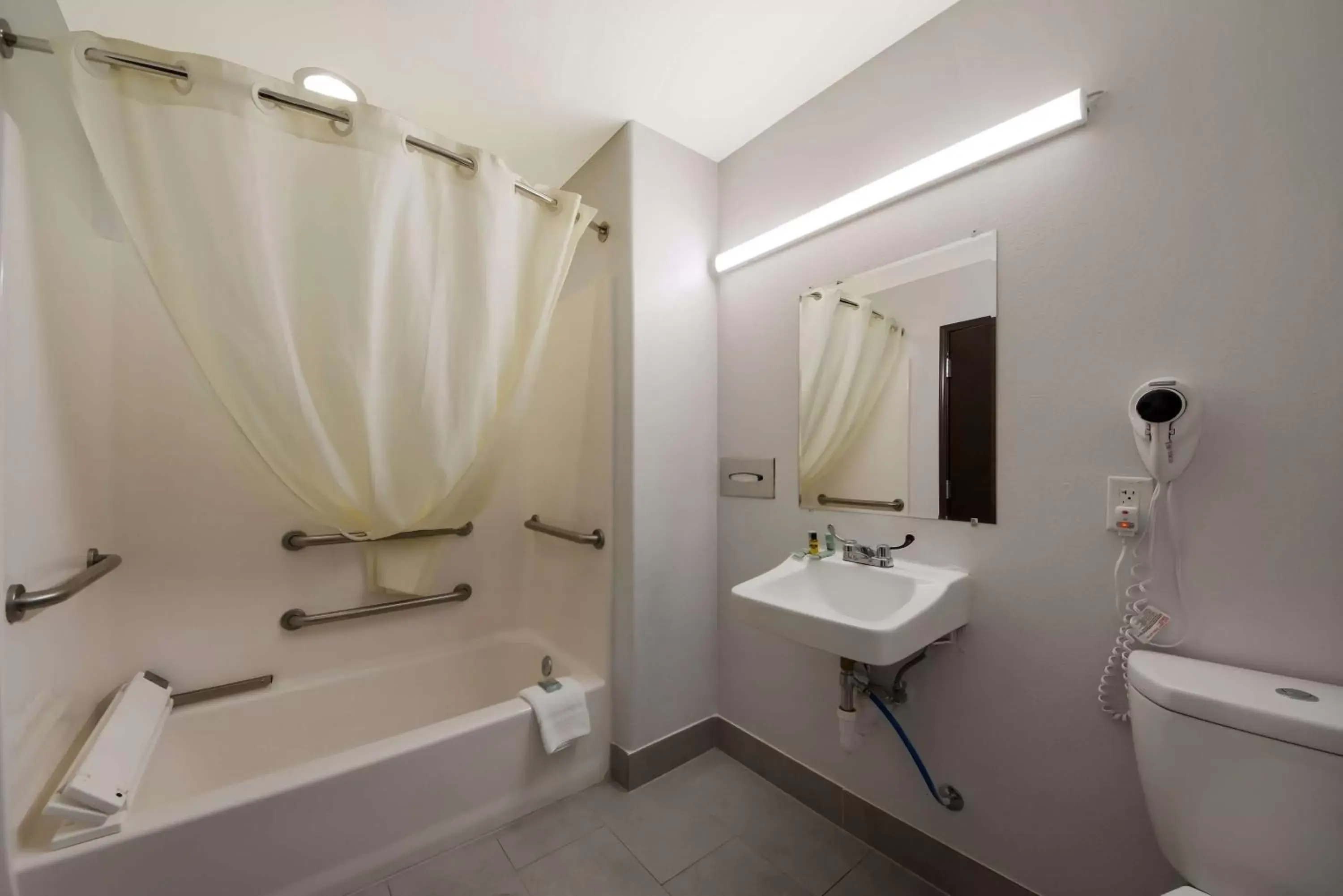 Bathroom in SureStay Hotel by Best Western San Antonio West SeaWorld