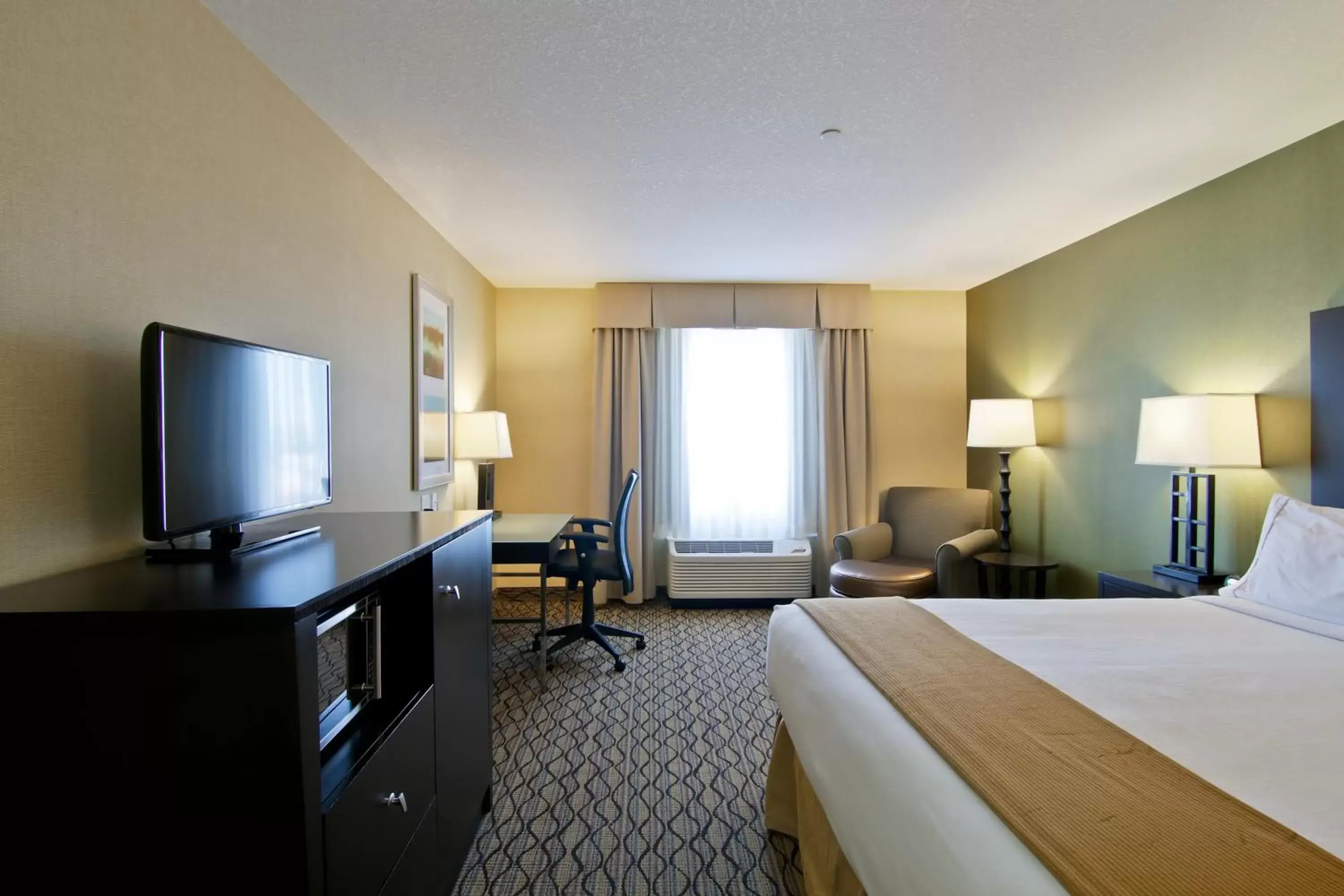 Photo of the whole room, TV/Entertainment Center in Holiday Inn Express Fort Saskatchewan, an IHG Hotel