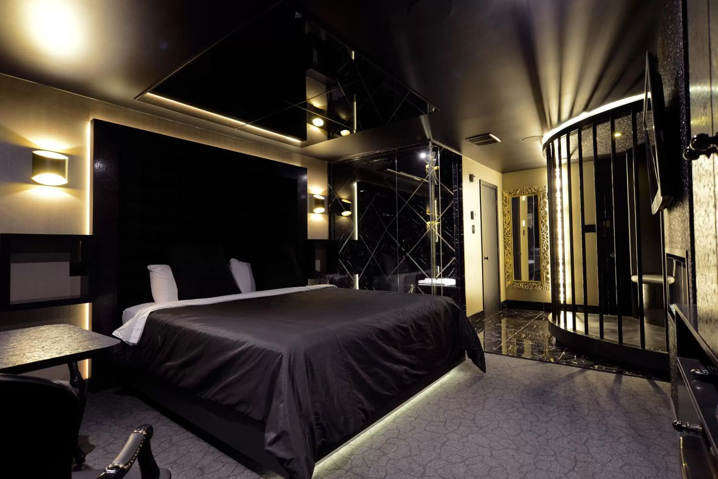 Bed in Le Fabreville Motel & Suites