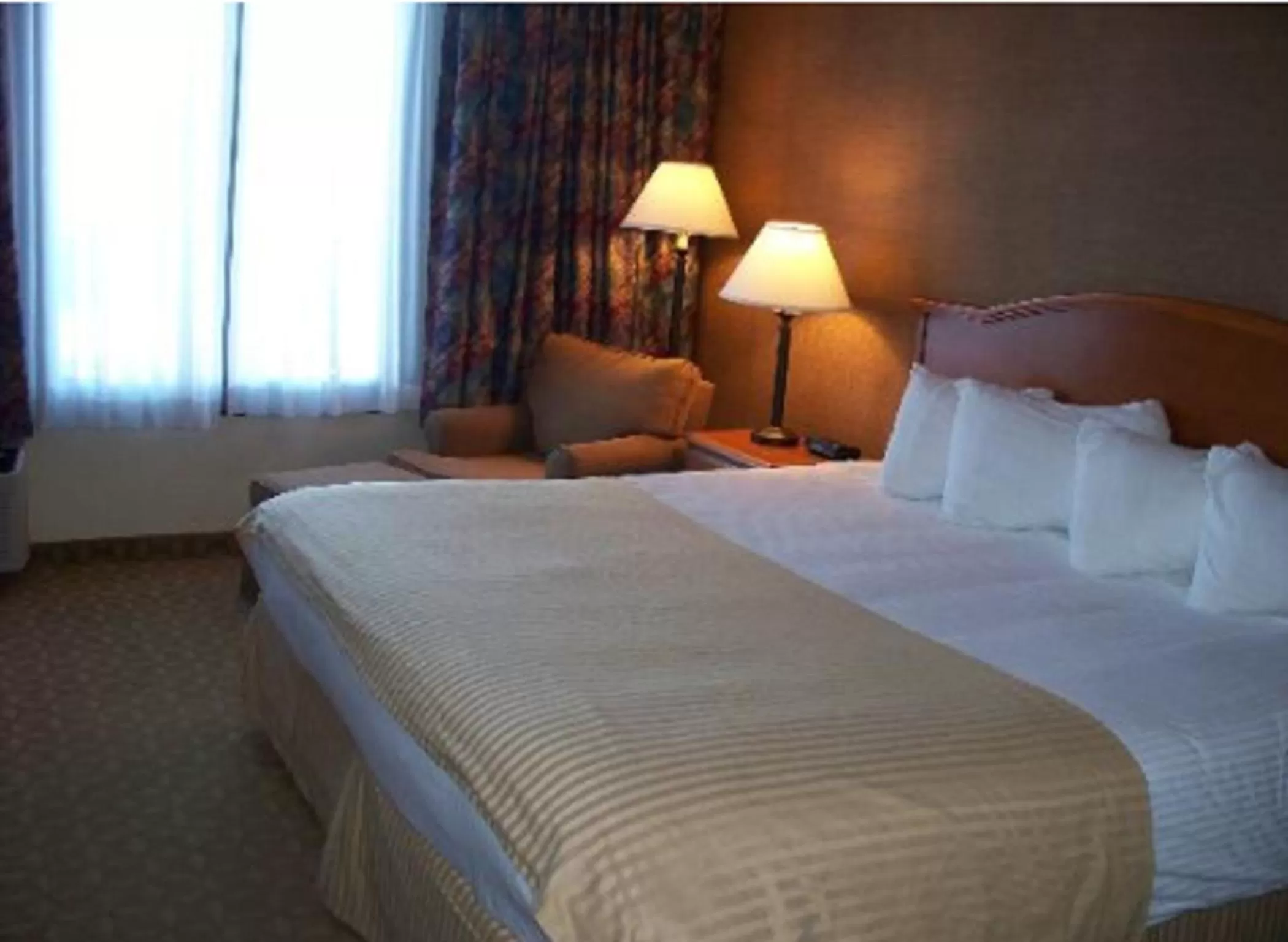 Bed in Ramada by Wyndham Watertown Thousand