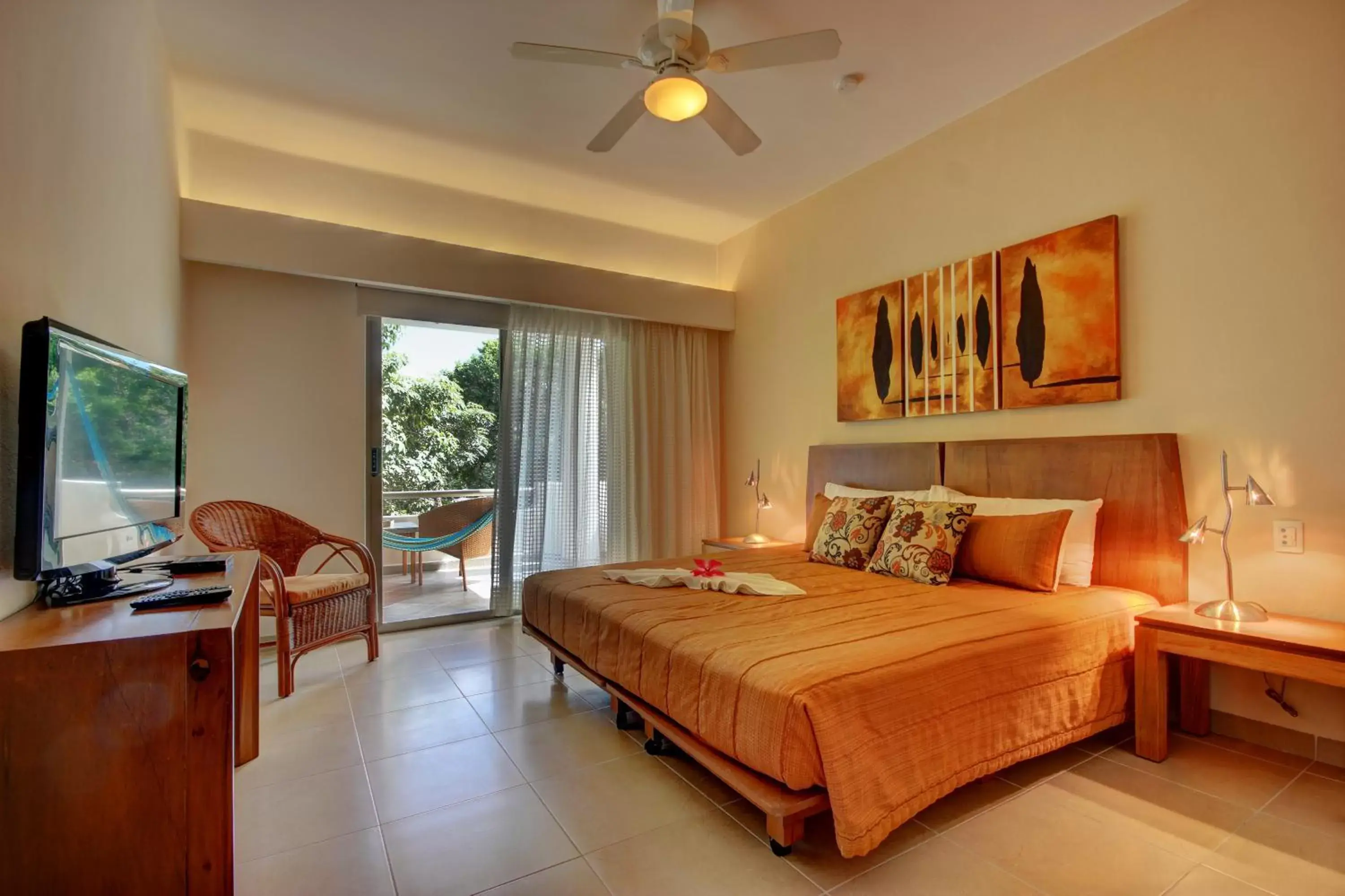 Bedroom in Riviera Maya Suites
