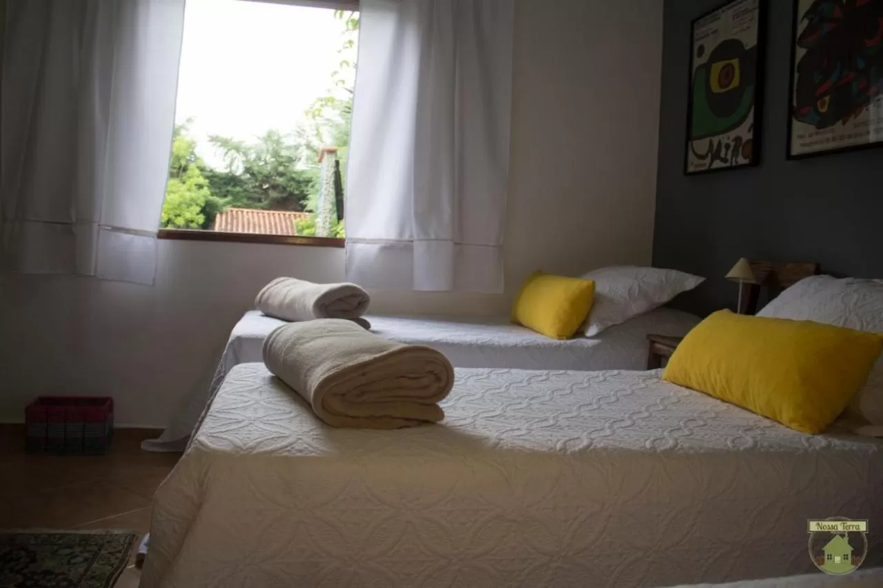 Bed in Pousada Nossa Terra