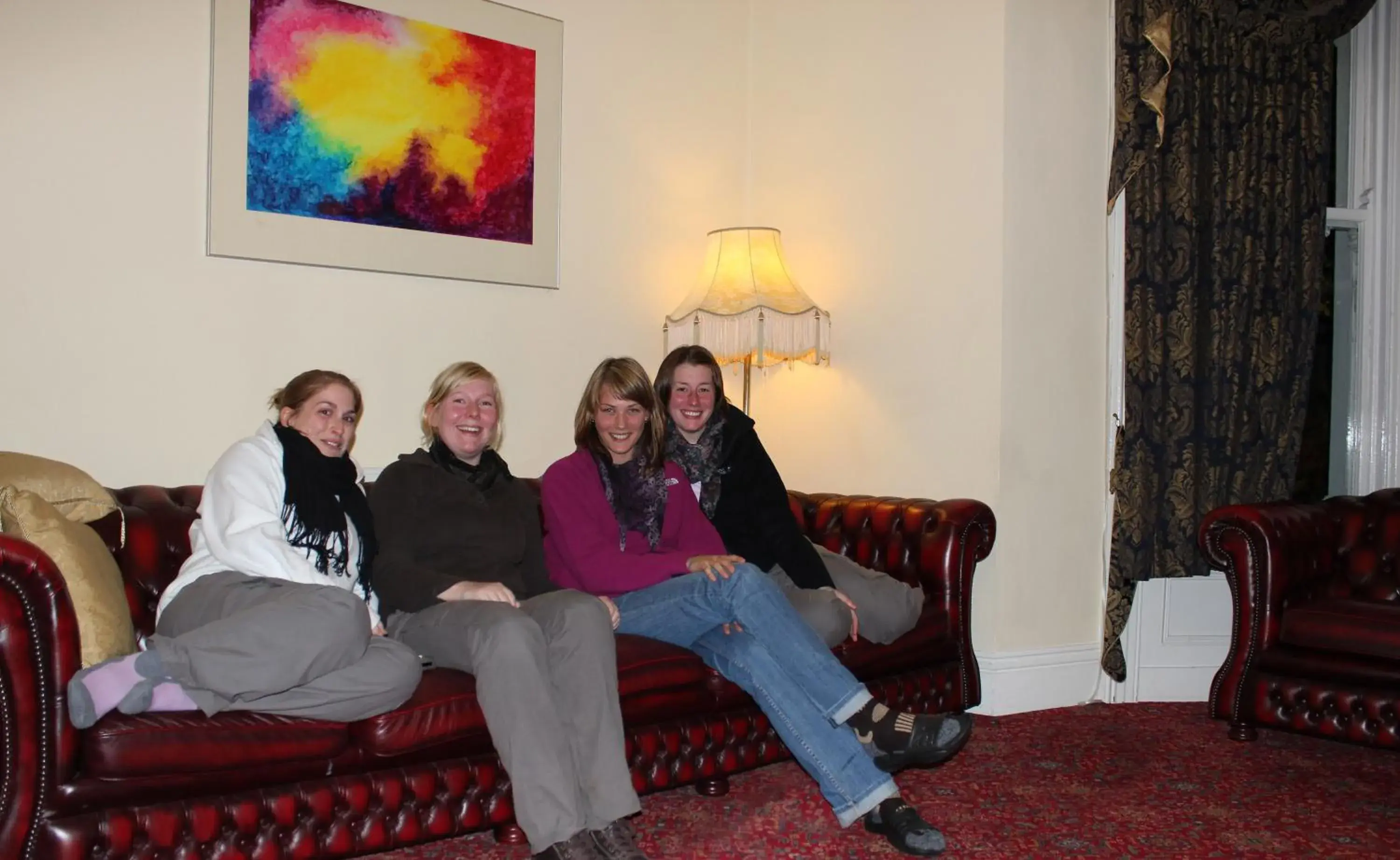 Communal lounge/ TV room in Llandudno Hostel
