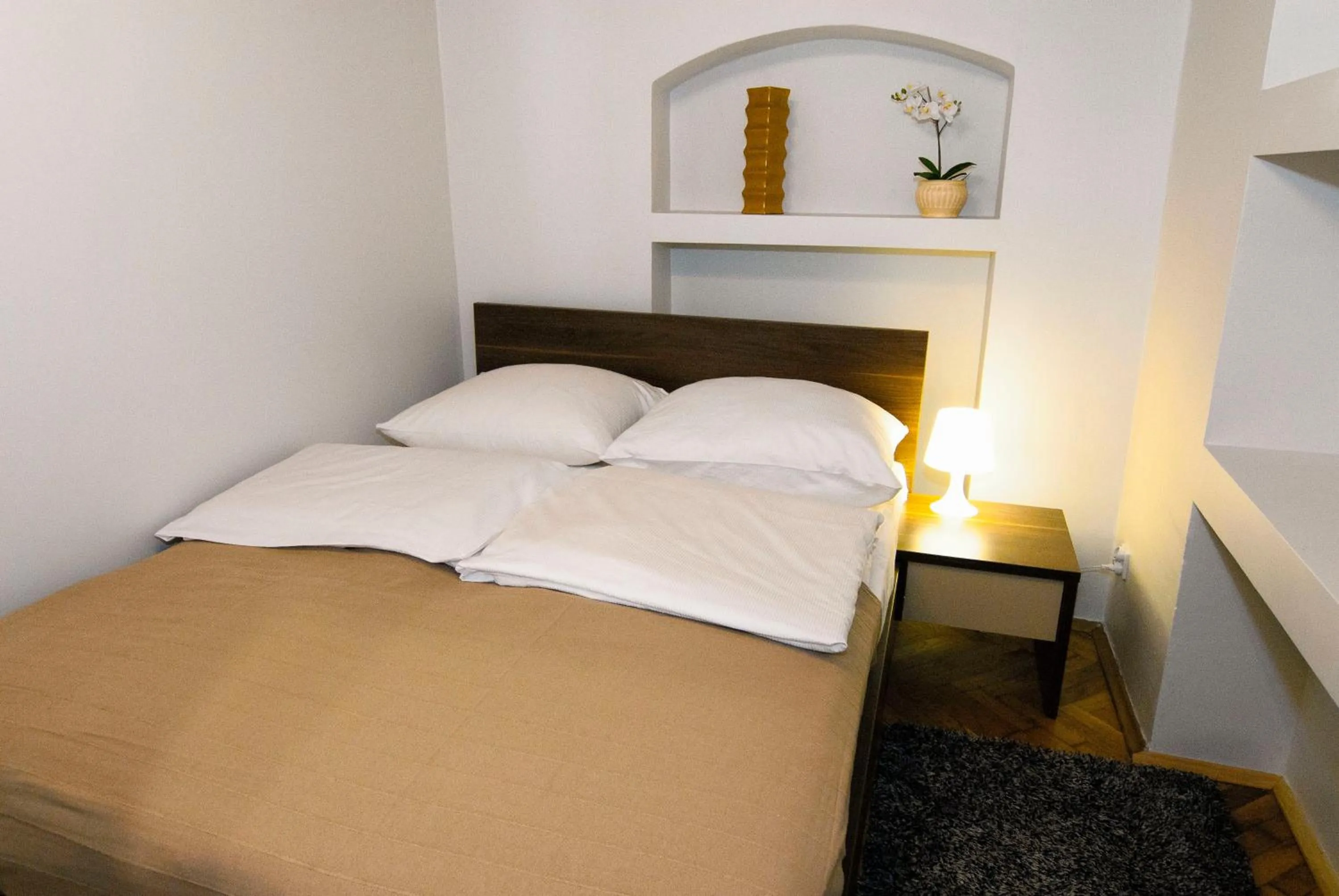 Bed in P&J Apartments Floriańska