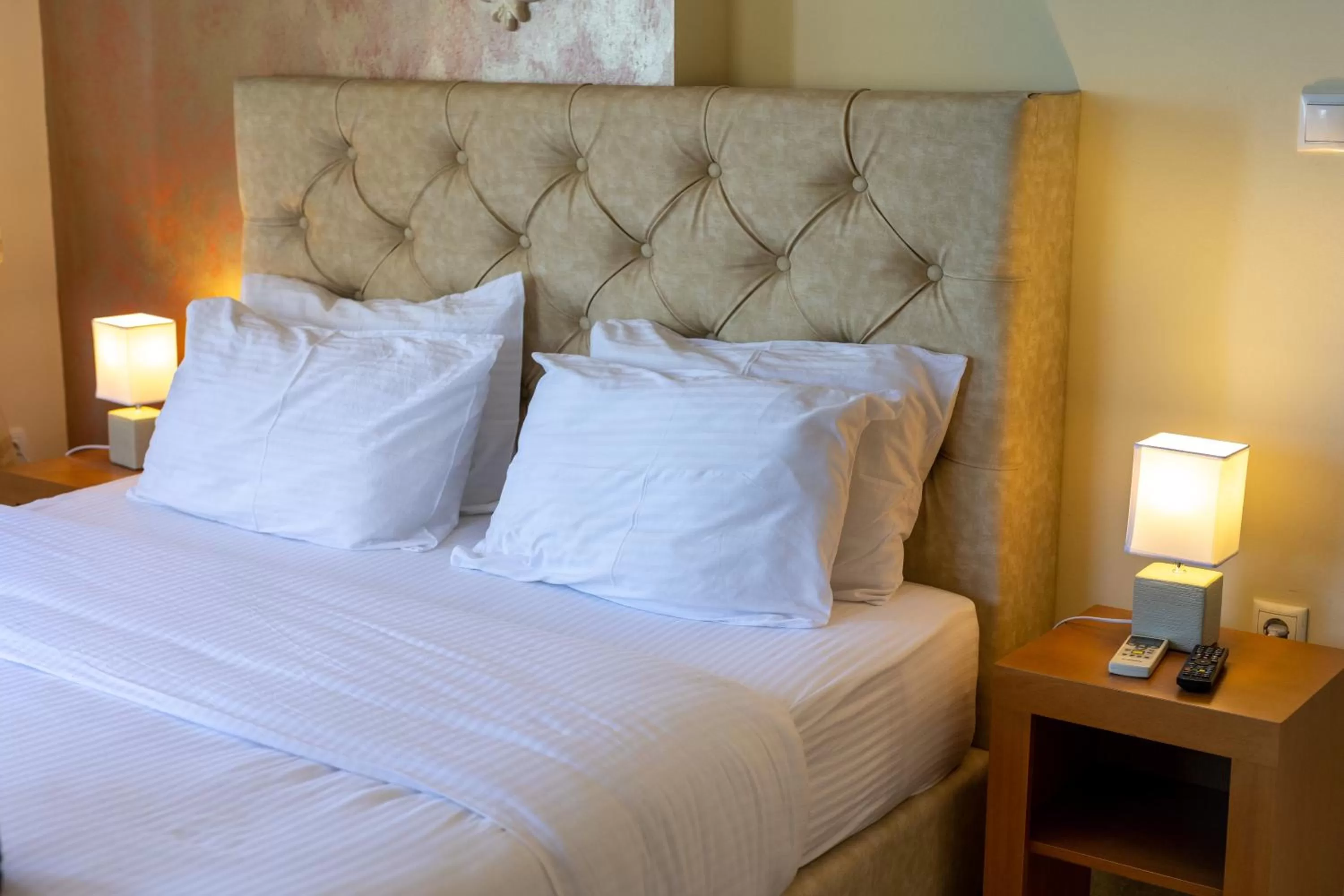 Bed in Votsalakia Hotel & Luxury Apartments