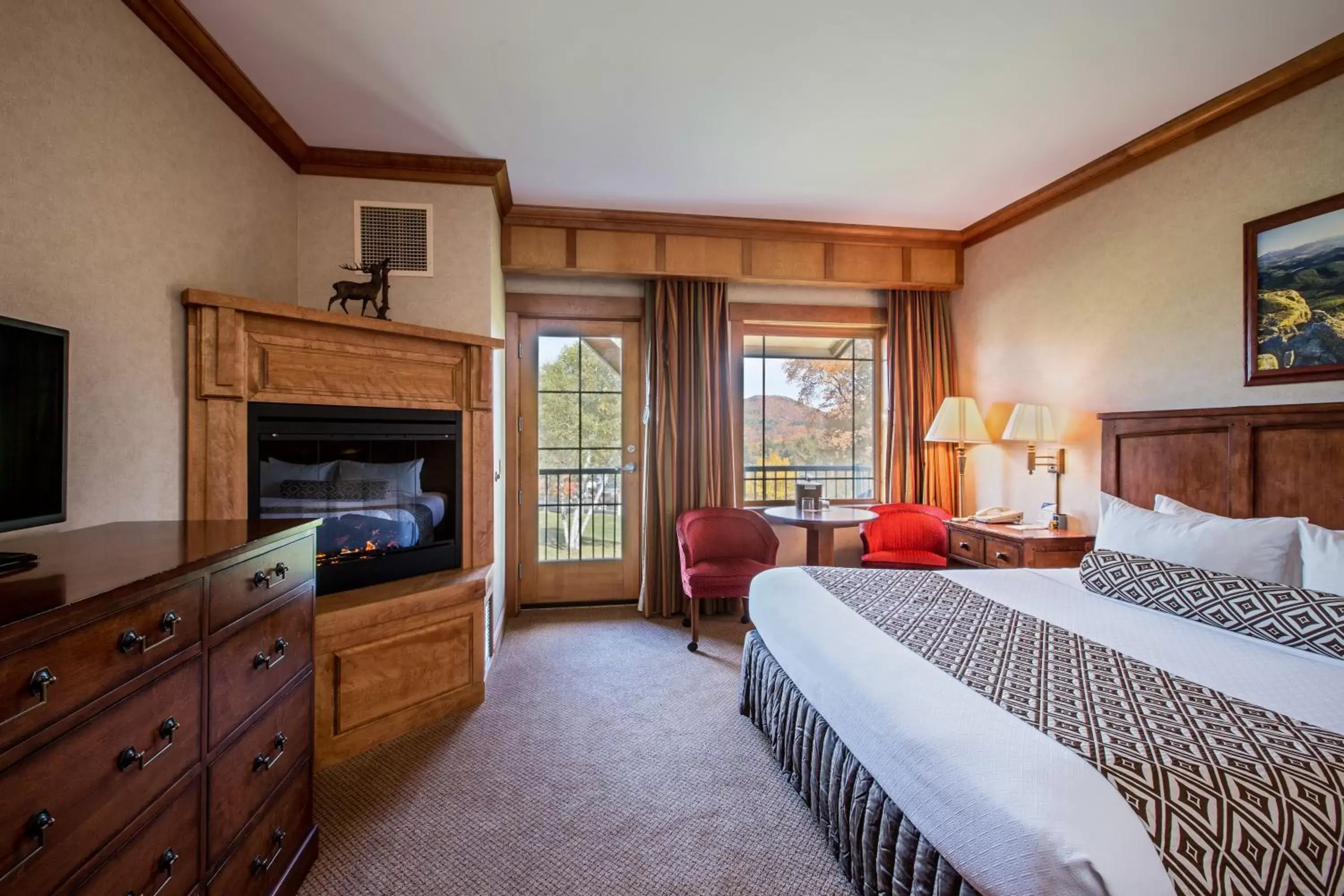 Photo of the whole room, TV/Entertainment Center in Crowne Plaza Lake Placid, an IHG Hotel