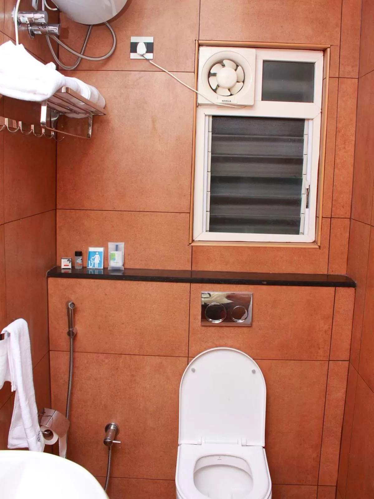 Toilet in Staylite Suites