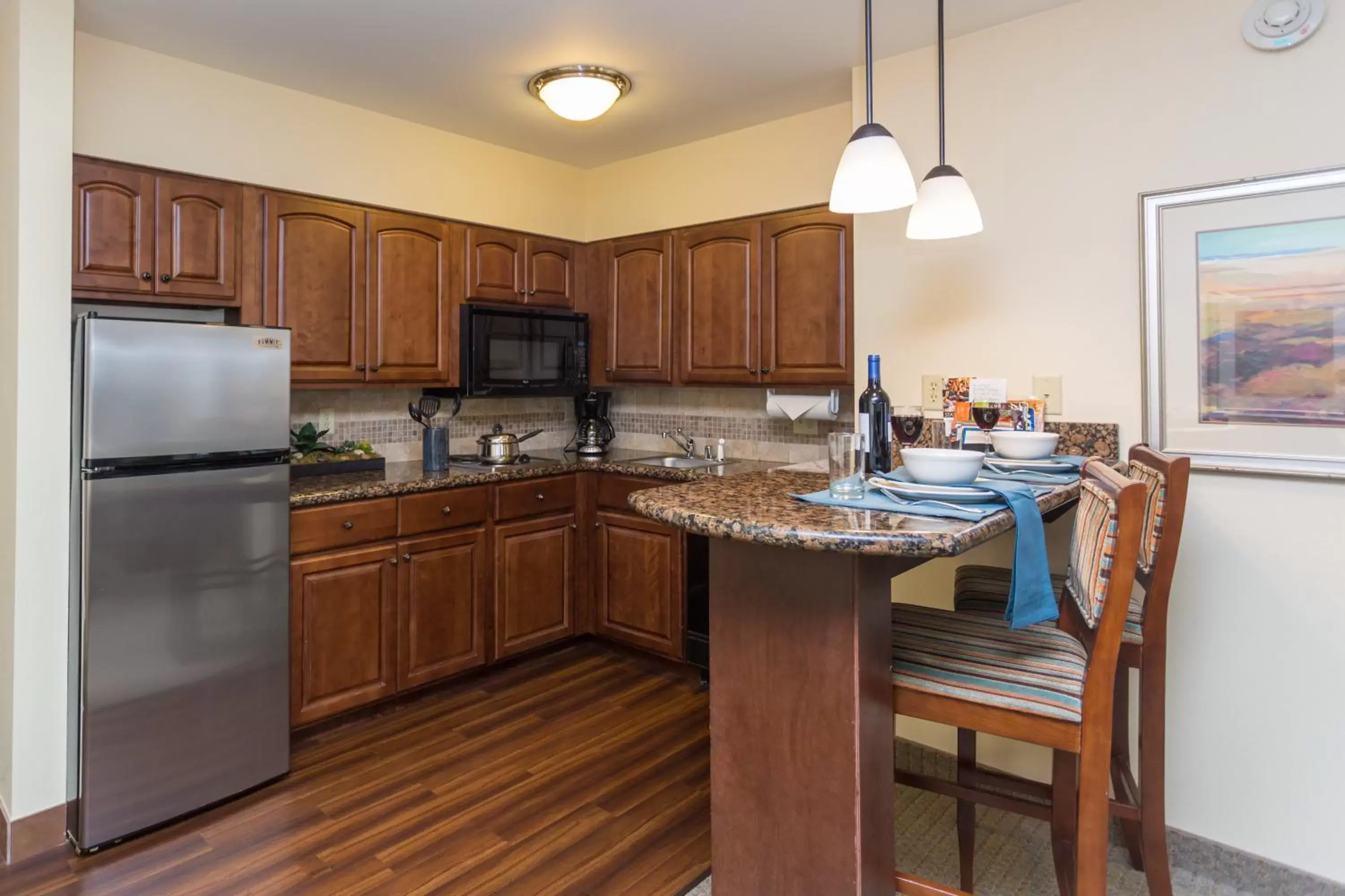 Kitchen or kitchenette, Kitchen/Kitchenette in Staybridge Suites Great Falls, an IHG Hotel