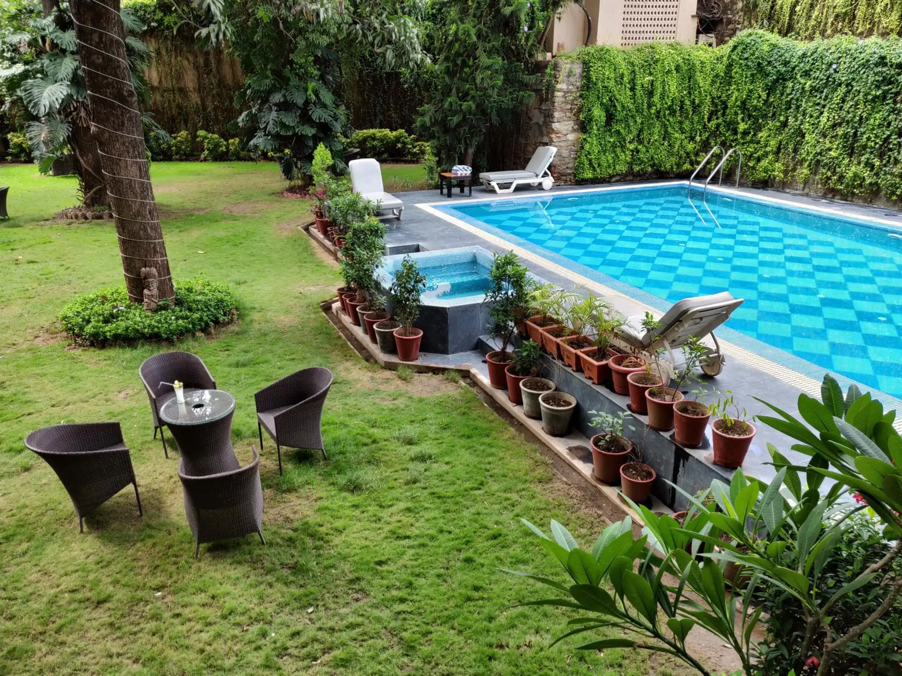 Garden, Pool View in Rajdarshan - A Lake View Hotel in Udaipur