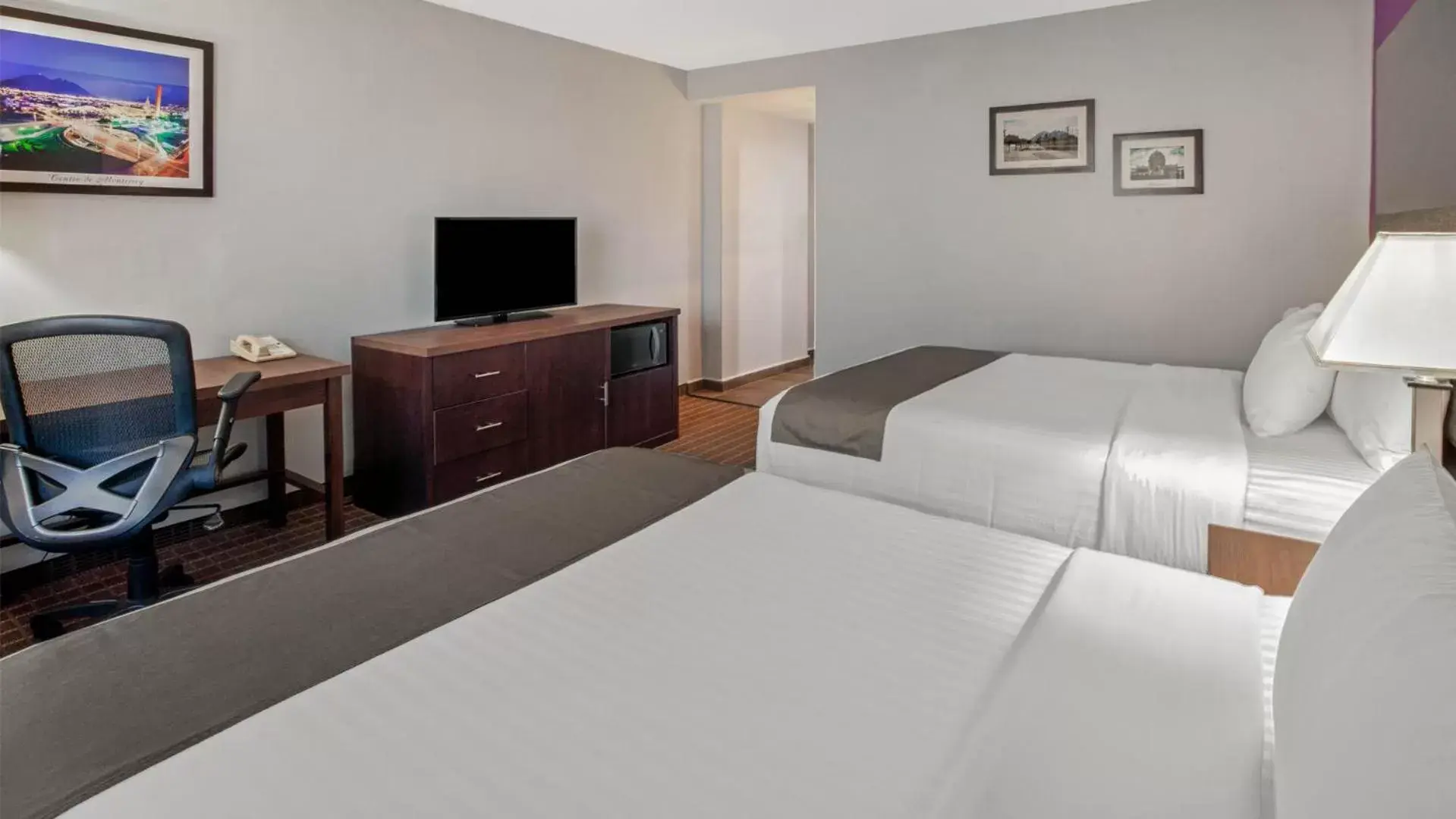 Property building, Bed in CHN Hotel Monterrey Centro, Trademark Collection by Wyndham