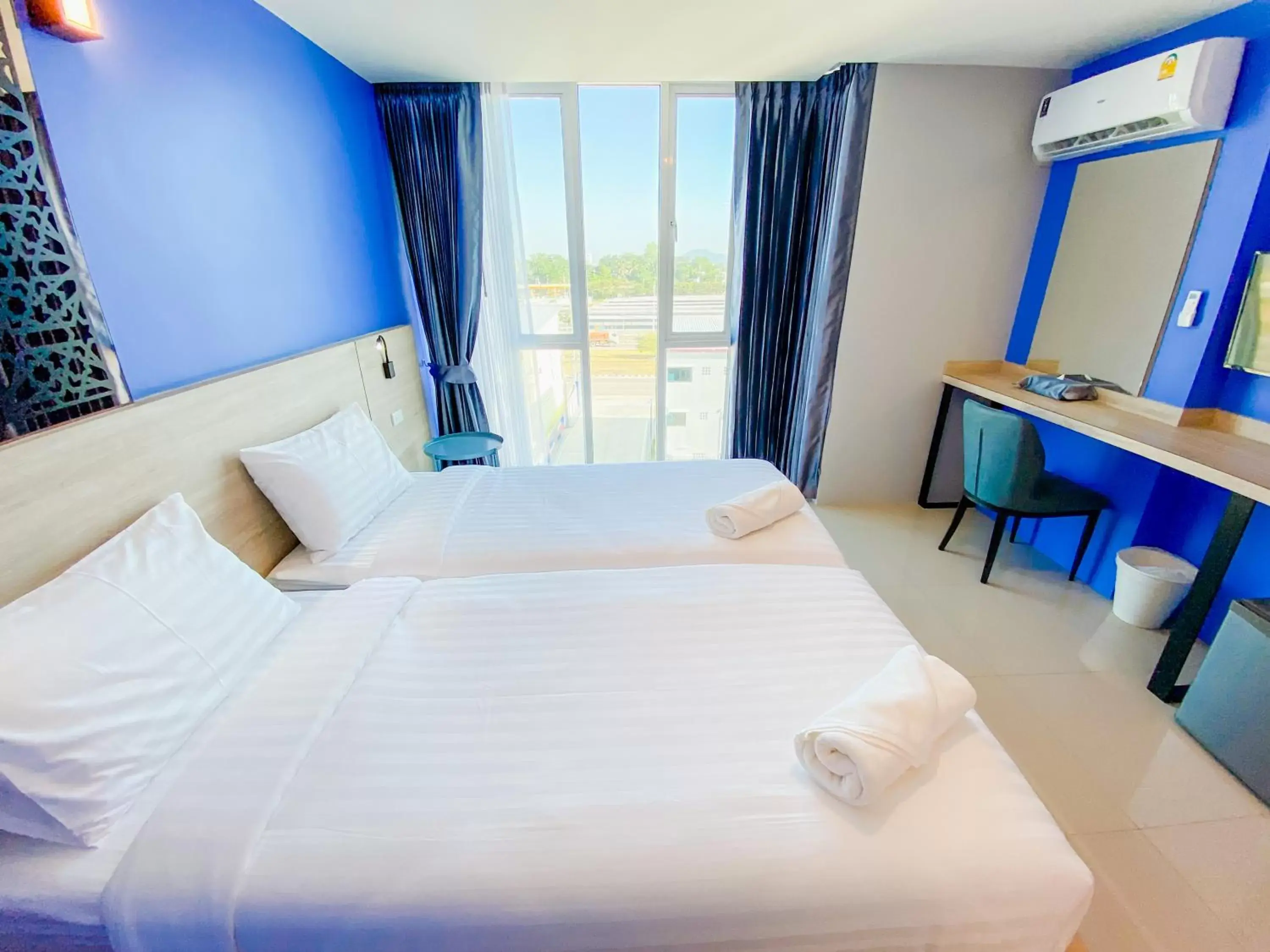 Bed in วัน บัดเจท เชียงราย สนามบิน One Budget Hotel Chiangrai Airport Bed in วัน บัดเจท เชียงราย สนามบิน One Budget Hotel Chiangrai Airport