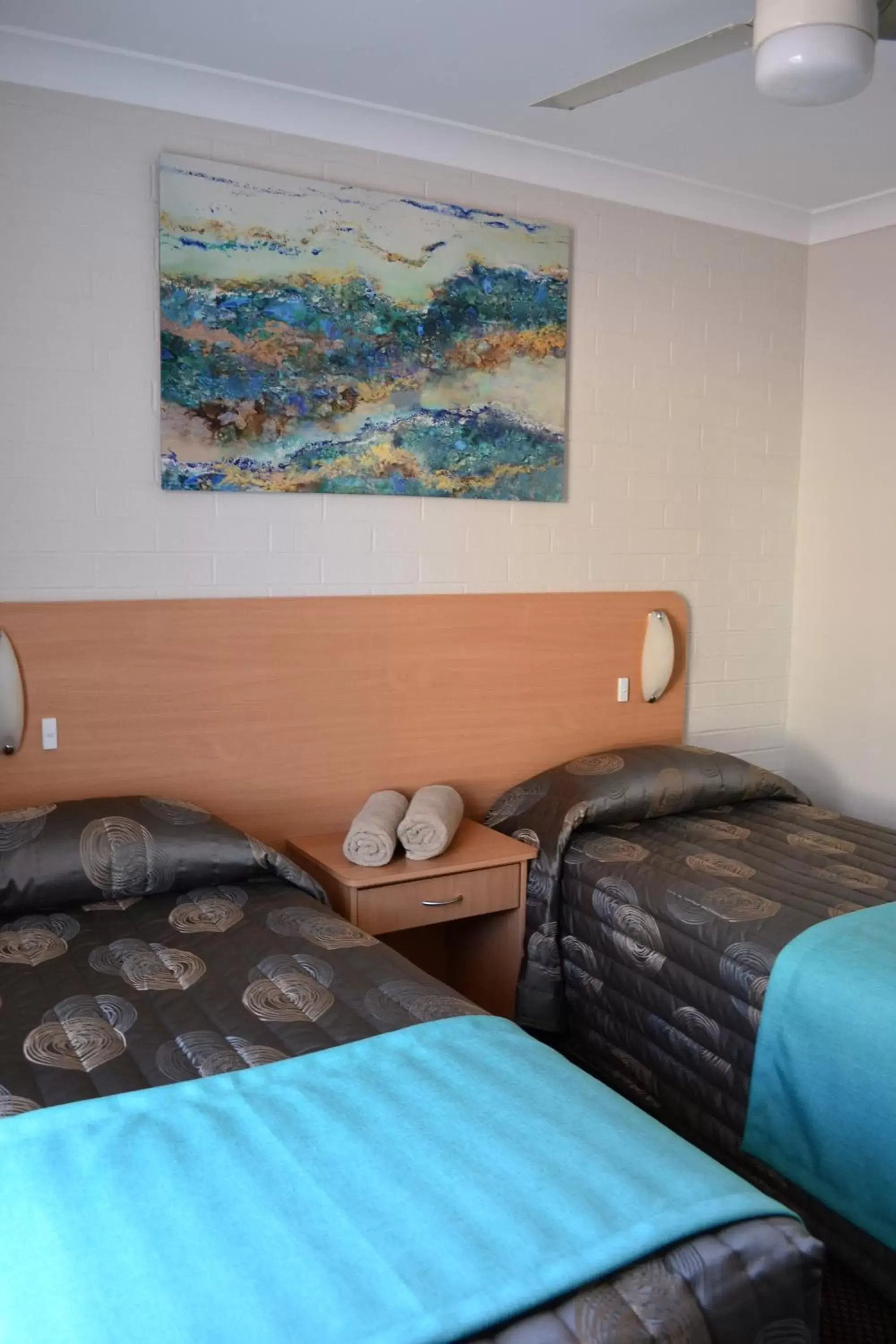 Bed in Cattlemans Country Motor Inn & Serviced Apartments