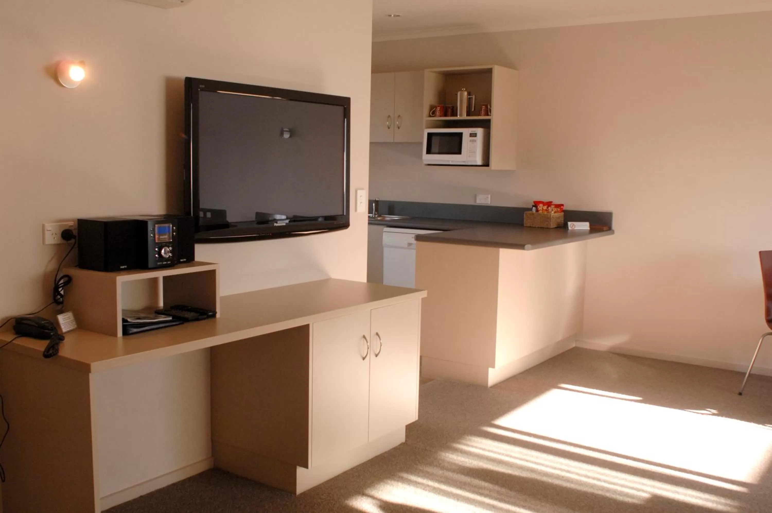 TV/Entertainment Center in 295 on Tay Motel