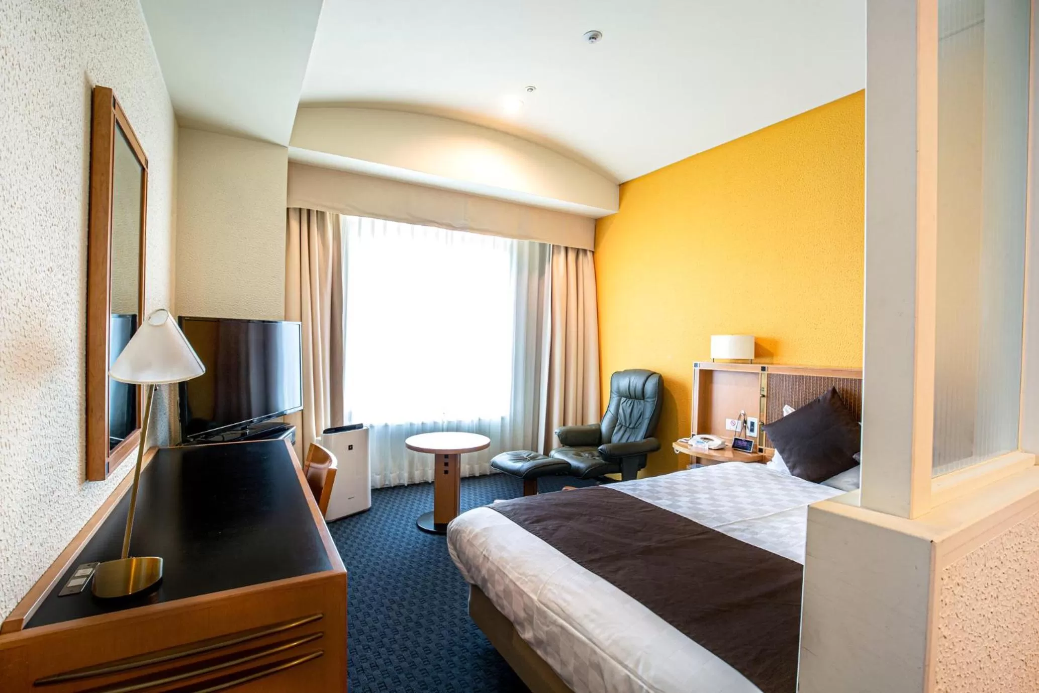 Bed in Hotel Nagoya Garden Palace